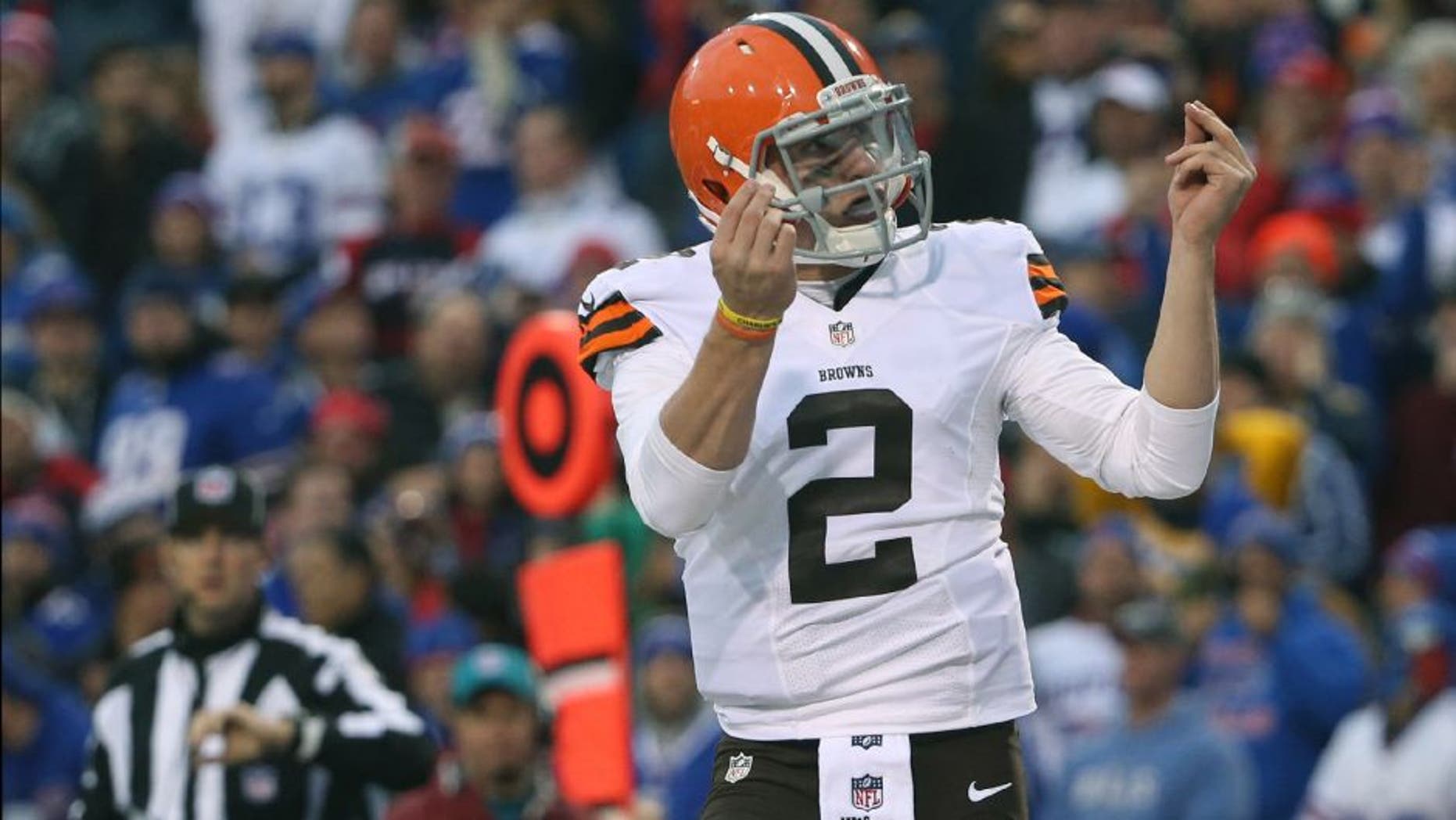 ORCHARD PARK, NY - NOVEMBER 30: Johnny Manziel #2 of the Cleveland Browns celebrates after scoring a touchdown during NFL game action against the Buffalo Bills at Ralph Wilson Stadium on November 30, 2014 in Orchard Park, New York. (Photo by Tom Szczerbowski/Getty Images)