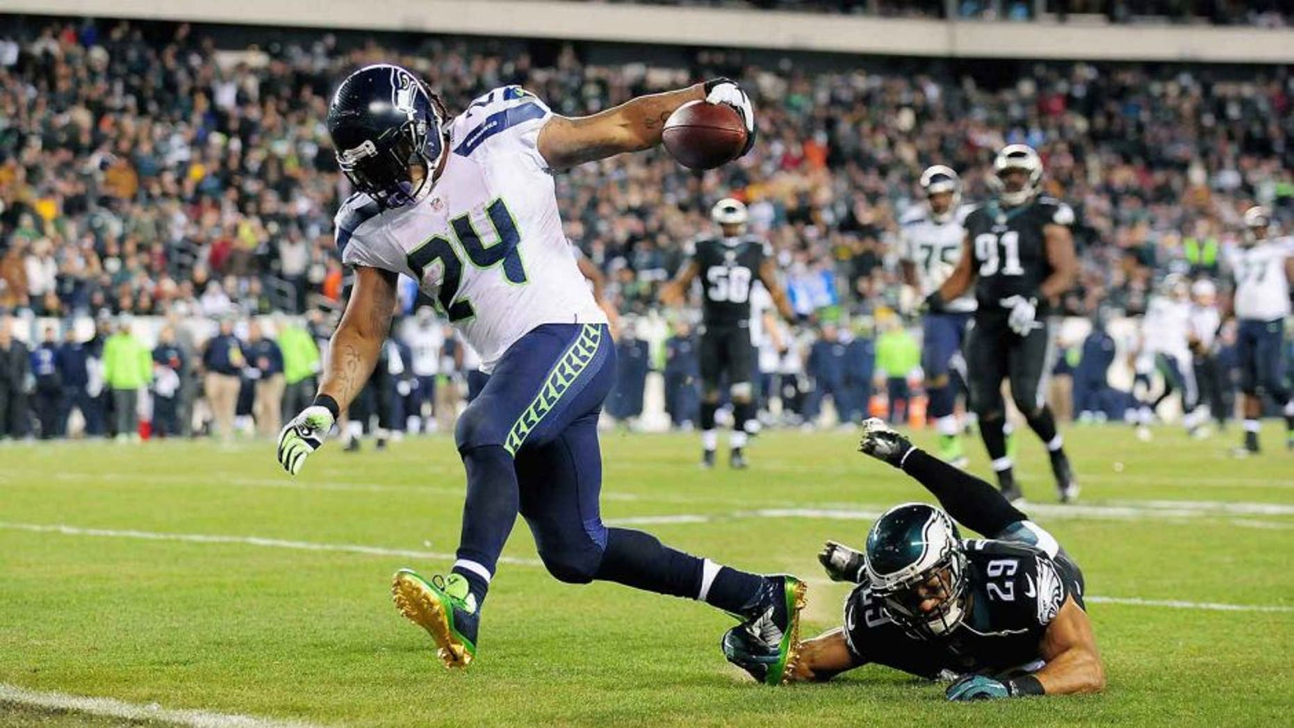 Mark Sanchez #3 of the Philadelphia Eagles looks to pass the ball against the Carolina Panthers on November 10, 2014 at Lincoln Financial Field in Philadelphia, Pennsylvania. (Photo by Elsa/Getty Images) Richard Sherman #25 of the Seattle Seahawks defends against the St. Louis Rams at the Edward Jones Dome on October 19, 2014 in St. Louis, Missouri. (Photo by Michael B. Thomas/Getty Images)