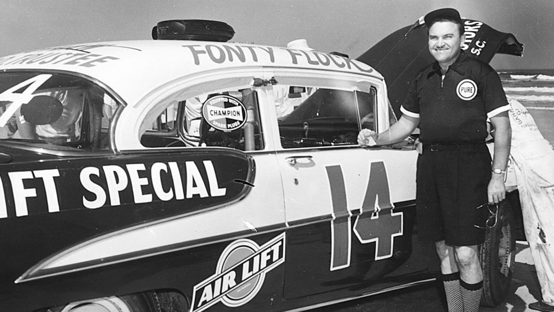 DAYTONA BEACH, FL - 1955: Fonty Flock with Frank Christian's 1955 Air Lift Special Oldsmobile at the Daytona Beach-Road Course in 1955. Flock finished fifth in the Grand National race that year. (Photo by ISC Archives via Getty Images)