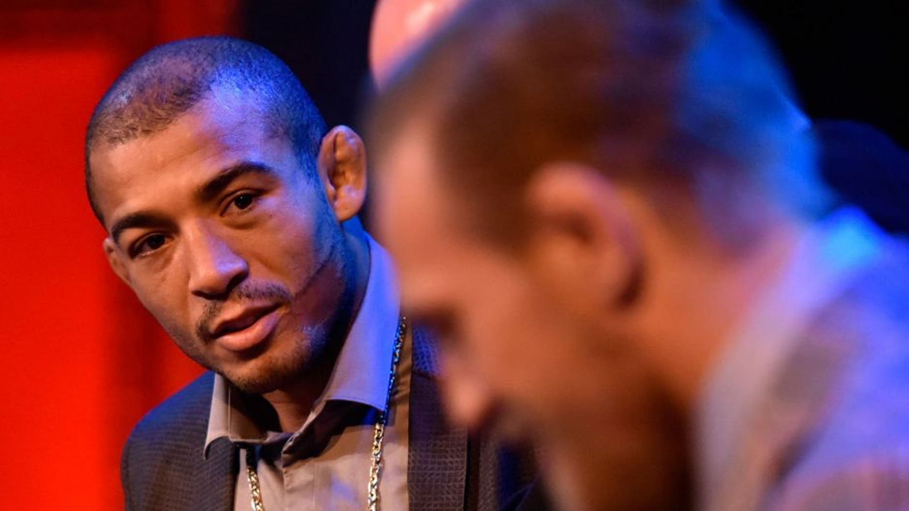 DORCHESTER, MA - MARCH 25: (L-R) UFC Featherweight Champion Jose Aldo stares down title challenger Conor McGregor of Ireland during the UFC 189 World Championship Press Tour press conference inside The Strand Theatre on March 25, 2015 in Dorchester, Massachusetts. (Photo by Jeff Bottari/Zuffa LLC/Zuffa LLC via Getty Images)