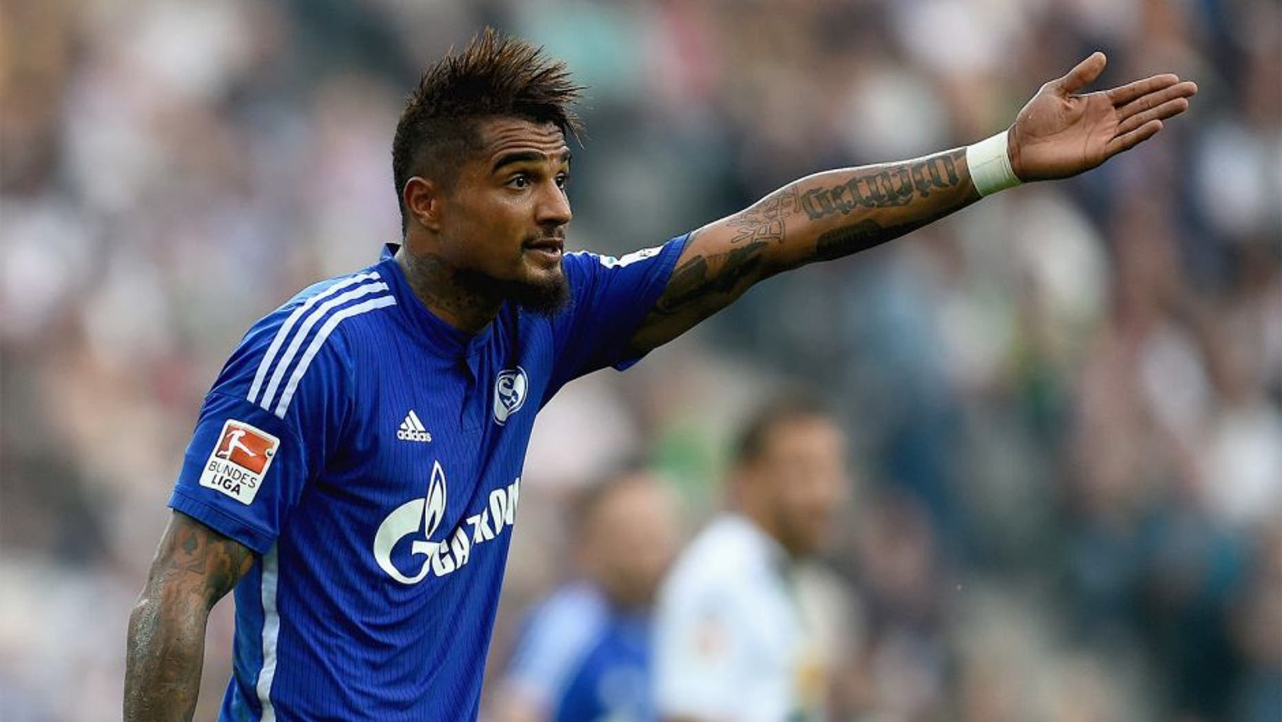 MOENCHENGLADBACH, GERMANY - SEPTEMBER 13: Kevin Prince-Boateng of FC Schalke 04 reacts during the Bundesliga match between Borussia Moenchengladbach and FC Schalke 04 at Borussia Park Stadium on September 13, 2014 in Moenchengladbach, Germany. (Photo by Dennis Grombkowski/Bongarts/Getty Images)
