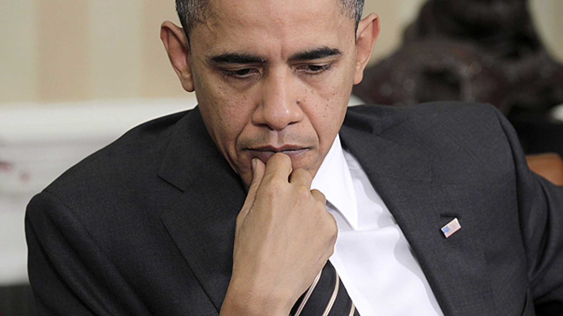 Dec. 8: President Obama pauses during his meeting with Polish President Bronislaw Komorowski in the Oval Office.