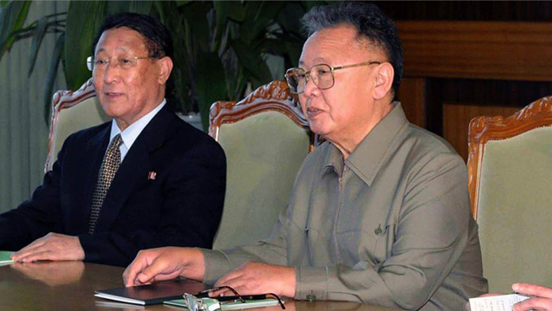 Dec. 9: In this photo released by Korean Central News Agency via Korea News Service in Tokyo, North Korean leader Kim Jong Il, right, holds a talk with Chinese State Councilor Dai Bingguo, unseen, during a meeting in Pyongyang, North Korea.