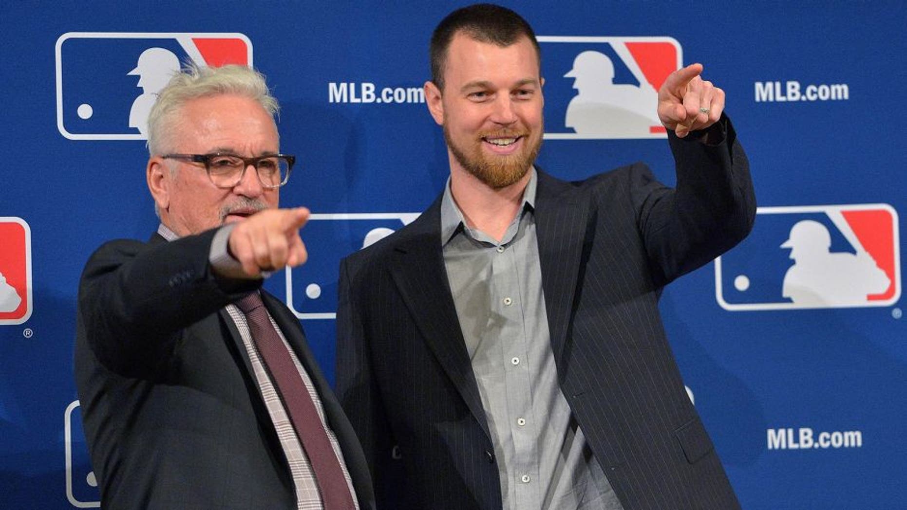 Ben Zobrist, right, with Chicago Cubs manager Joe Maddon in December.