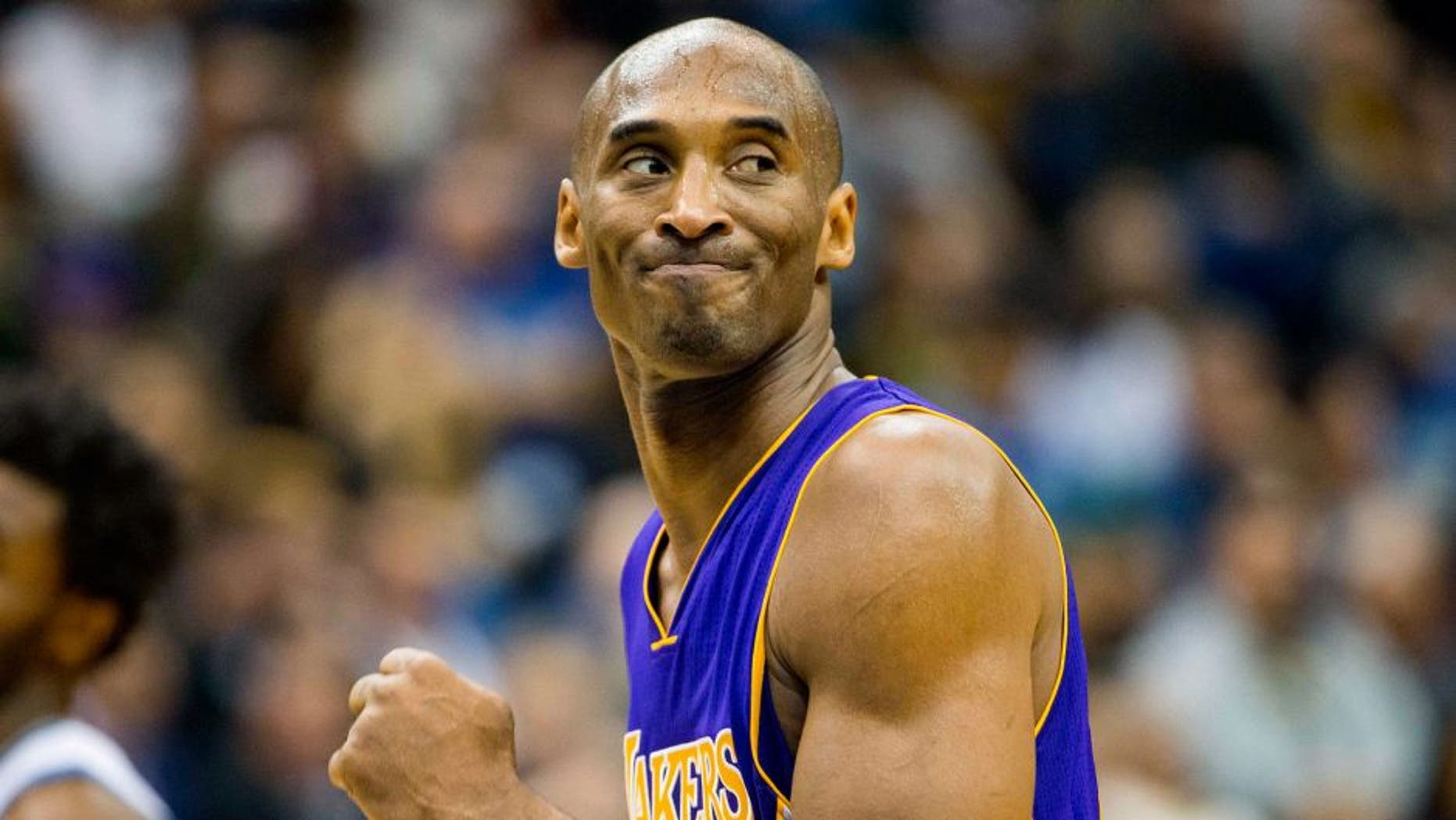 Dec 9, 2015; Minneapolis, MN, USA; Los Angeles Lakers forward Kobe Bryant (24) reacts after missing a shot in the second half against the Minnesota Timberwolves at Target Center. The Timberwolves won 123-122 in overtime. Mandatory Credit: Jesse Johnson-USA TODAY Sports