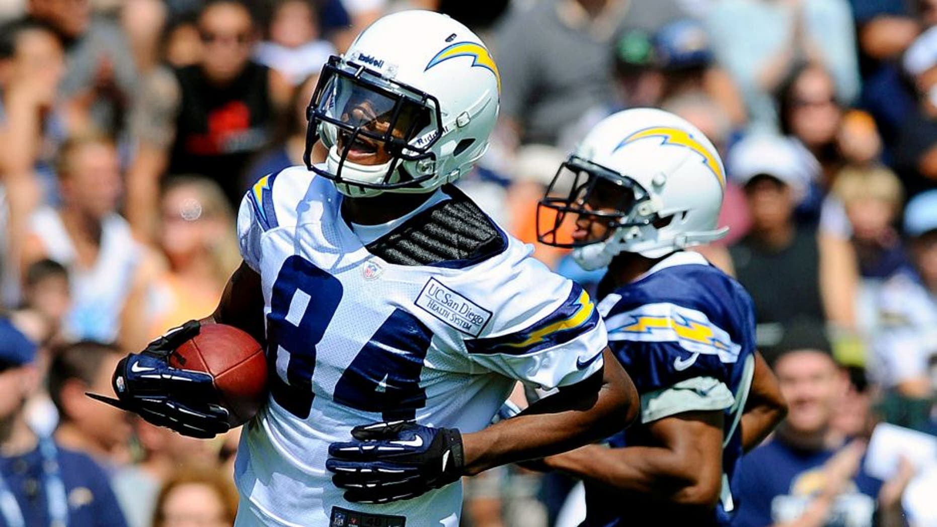 Jul 25, 2013; San Diego, CA, USA; San Diego Chargers receiver Danario Alexander (84) runs with the ball after a reception in receiver drills during training camp at Chargers Park. Mandatory Credit: Christopher Hanewinckel-USA TODAY Sports