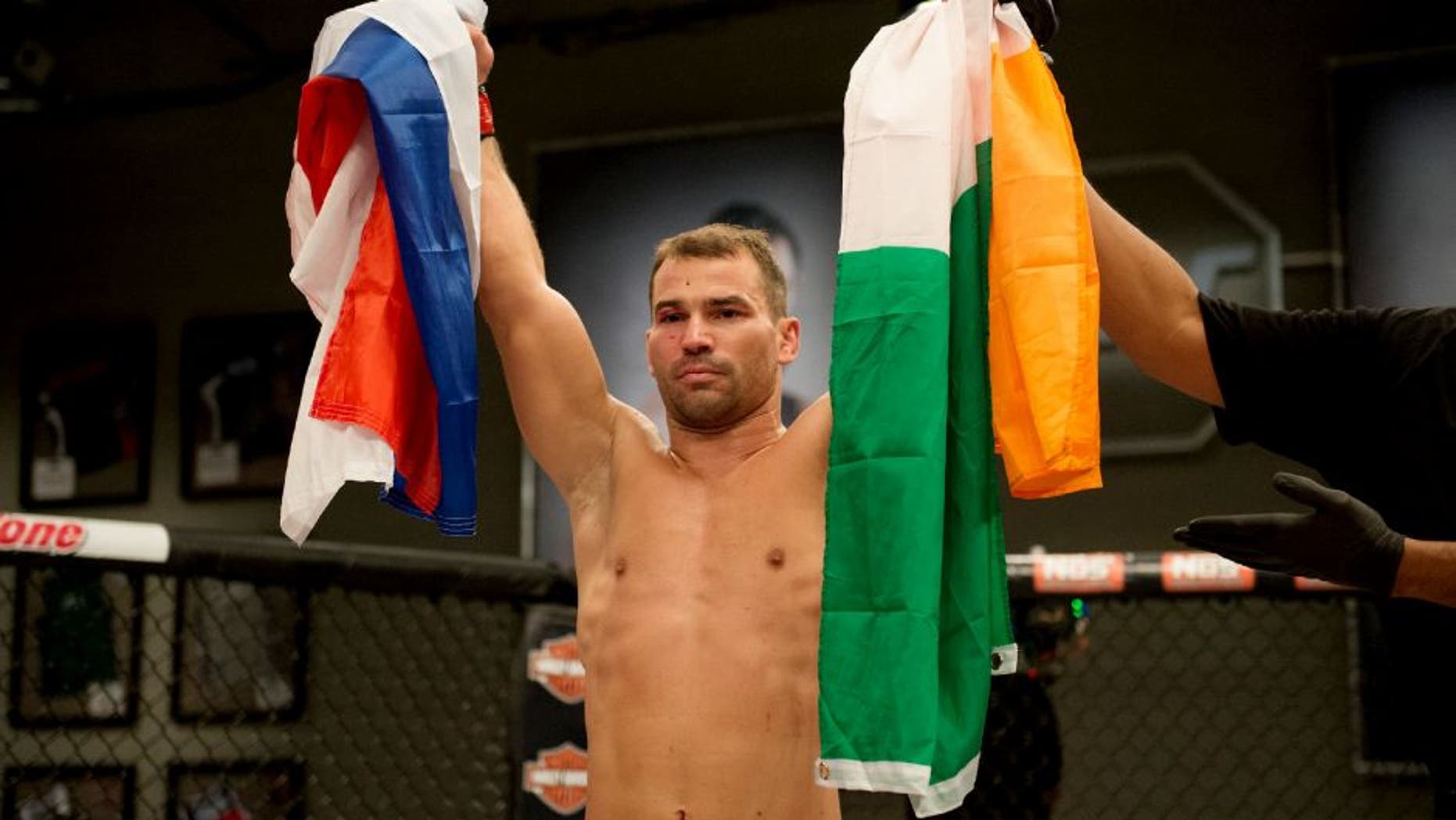 LAS VEGAS, NV - AUGUST 10: (L-R) Artem Lobov celebrates his victory over James Jenkins during the filming of The Ultimate Fighter: Team McGregor vs Team Faber at the UFC TUF Gym on August 10, 2015 in Las Vegas, Nevada. (Photo by Brandon Magnus/Zuffa LLC/Zuffa LLC via Getty Images)