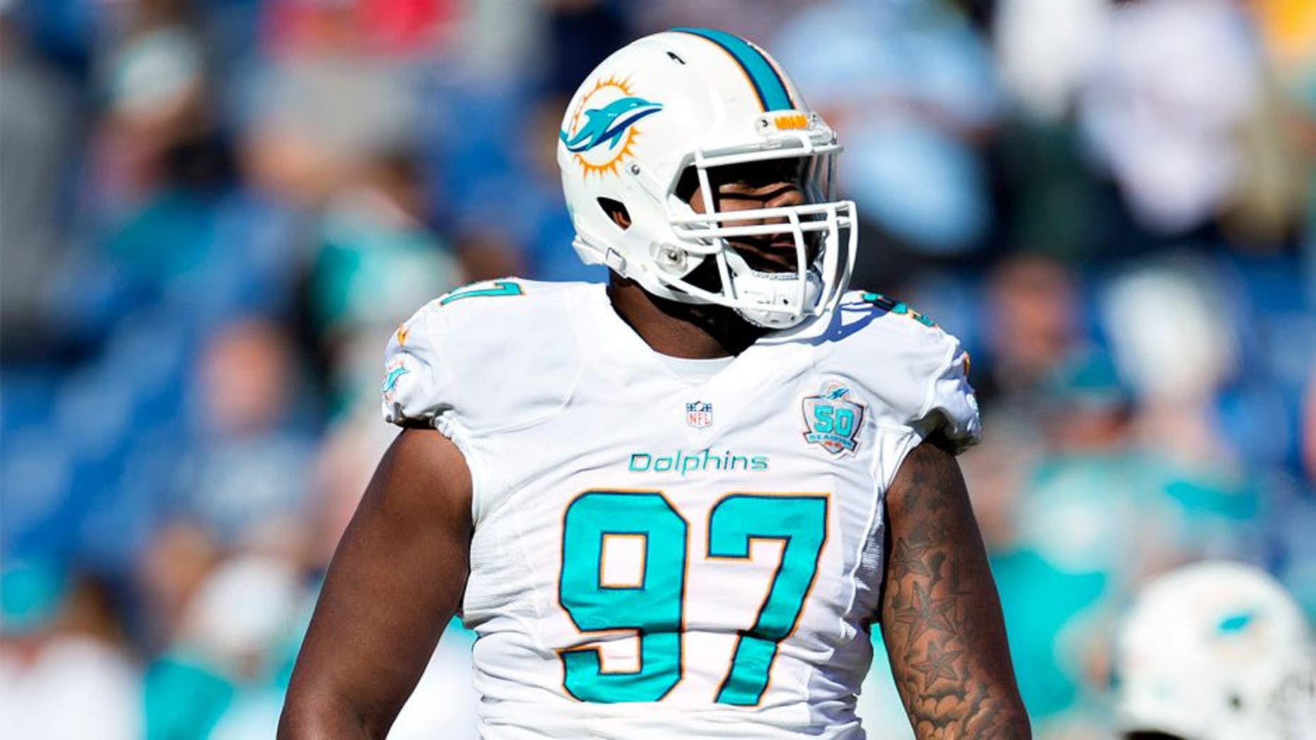 NASHVILLE, TN - OCTOBER 18: Jordan Phillips #97 of the Miami Dolphins looks over the offense during a game against the Tennessee Titans at LP Field on October 18, 2015 in Nashville, Tennessee. The Dolphins defeated the Titans 38-10. (Photo by Wesley Hitt/Getty Images)