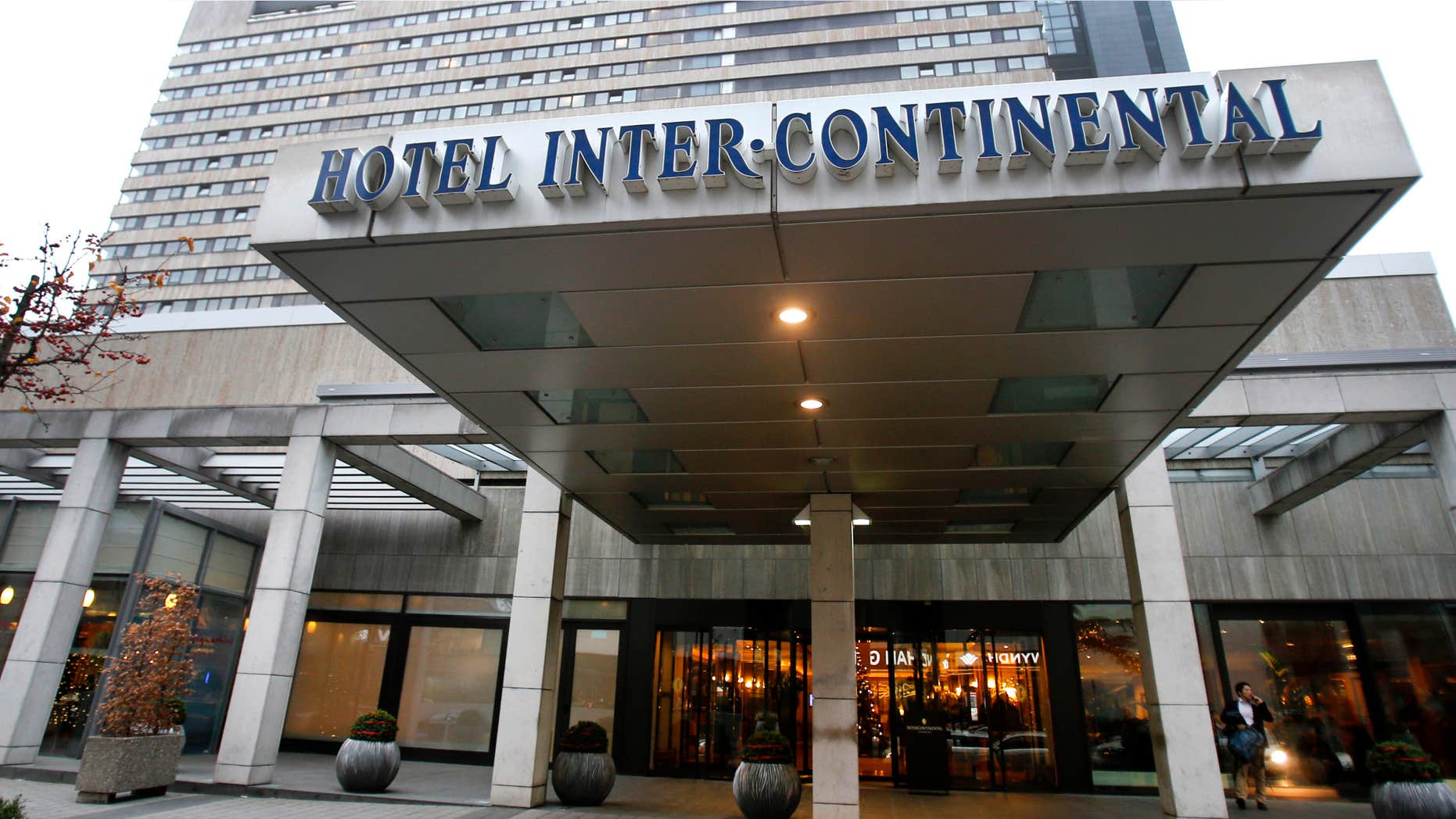 Dec. 10, 2015: A man speaks on his mobile phone in front of the Hotel InterContinental in Frankfurt, Germany.