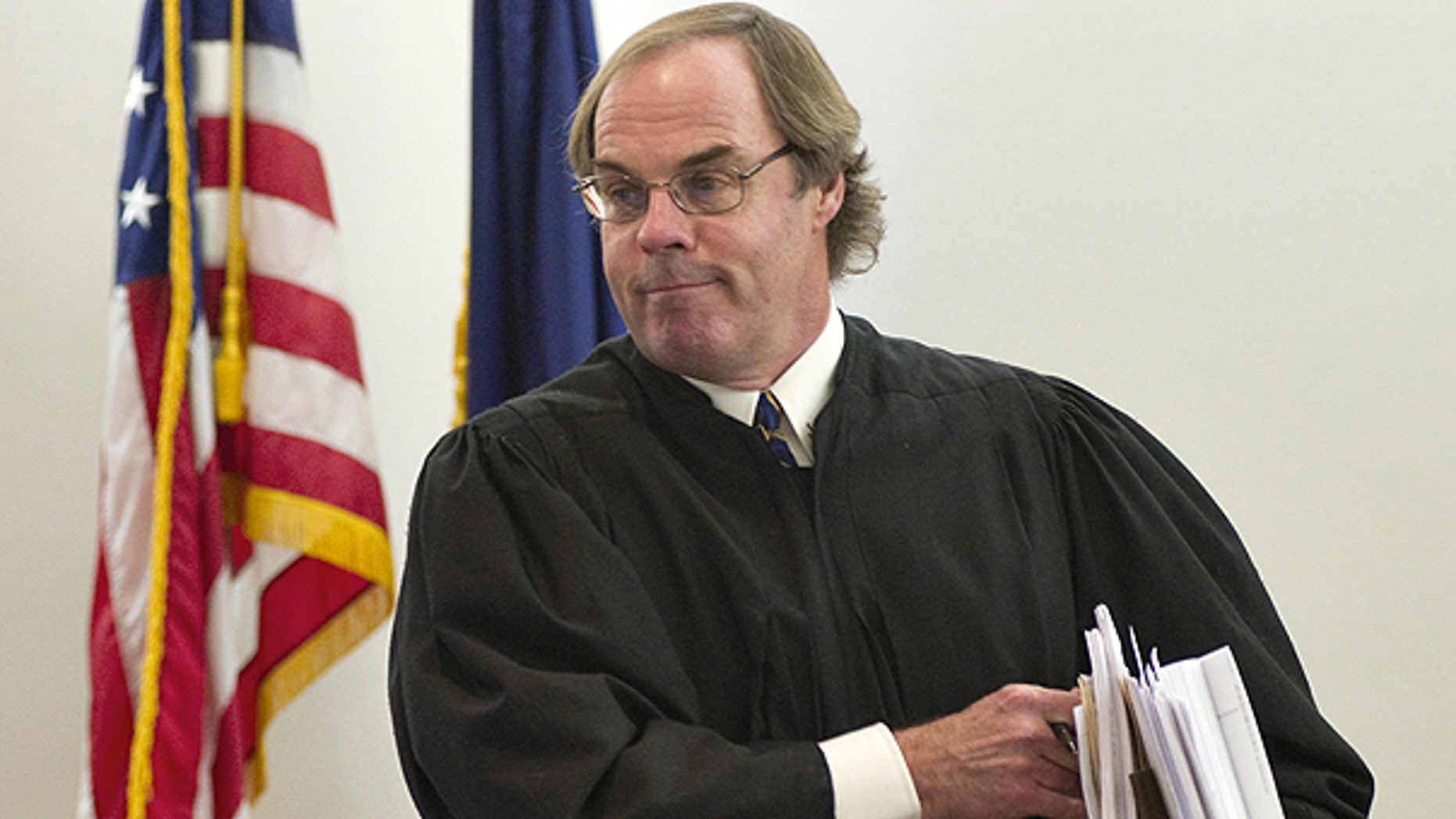 Dec. 8: Ketchikan Superior Court Judge William Carey gathers his documents after hearing arguments from attorneys representing the state of Alaska, Joe Miller and Sen. Lisa Murkowski at the Dimond Courthouse in Juneau, Alaksa.