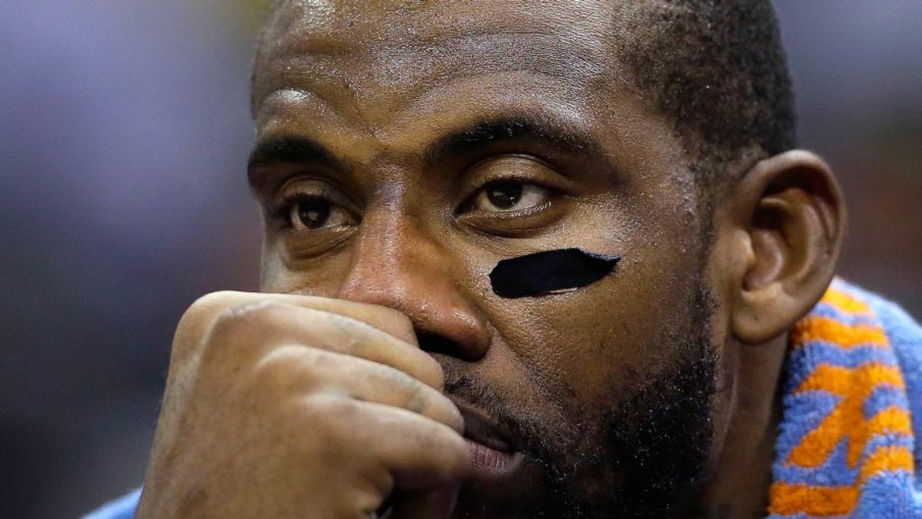 New York Knicks' Amar'e Stoudemire sits on the bench after he got into foul trouble during the second half of an NBA basketball game against the San Antonio Spurs, Wednesday, Dec. 10, 2014, in San Antonio. San Antonio won 109-95. (AP Photo/Eric Gay)