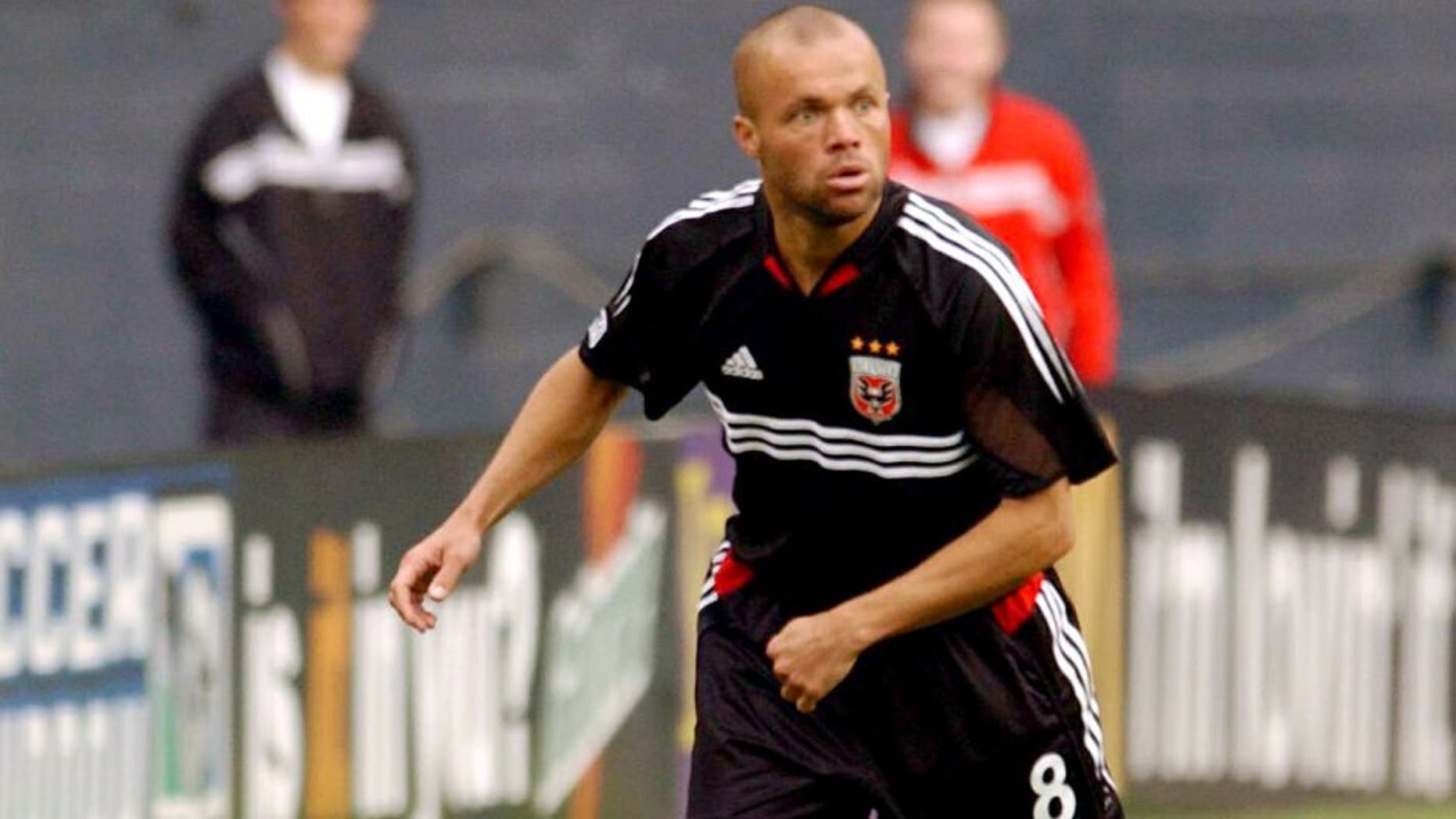 Earnie Stewart #8 of D.C. United looks to kick the ball against the San Jose Earthquakes in Washington D.C. on April 3, 2004. D.C. United defeated the Earthquakes 2-1. (Photo by Joe Murphy/MLSNETImages)