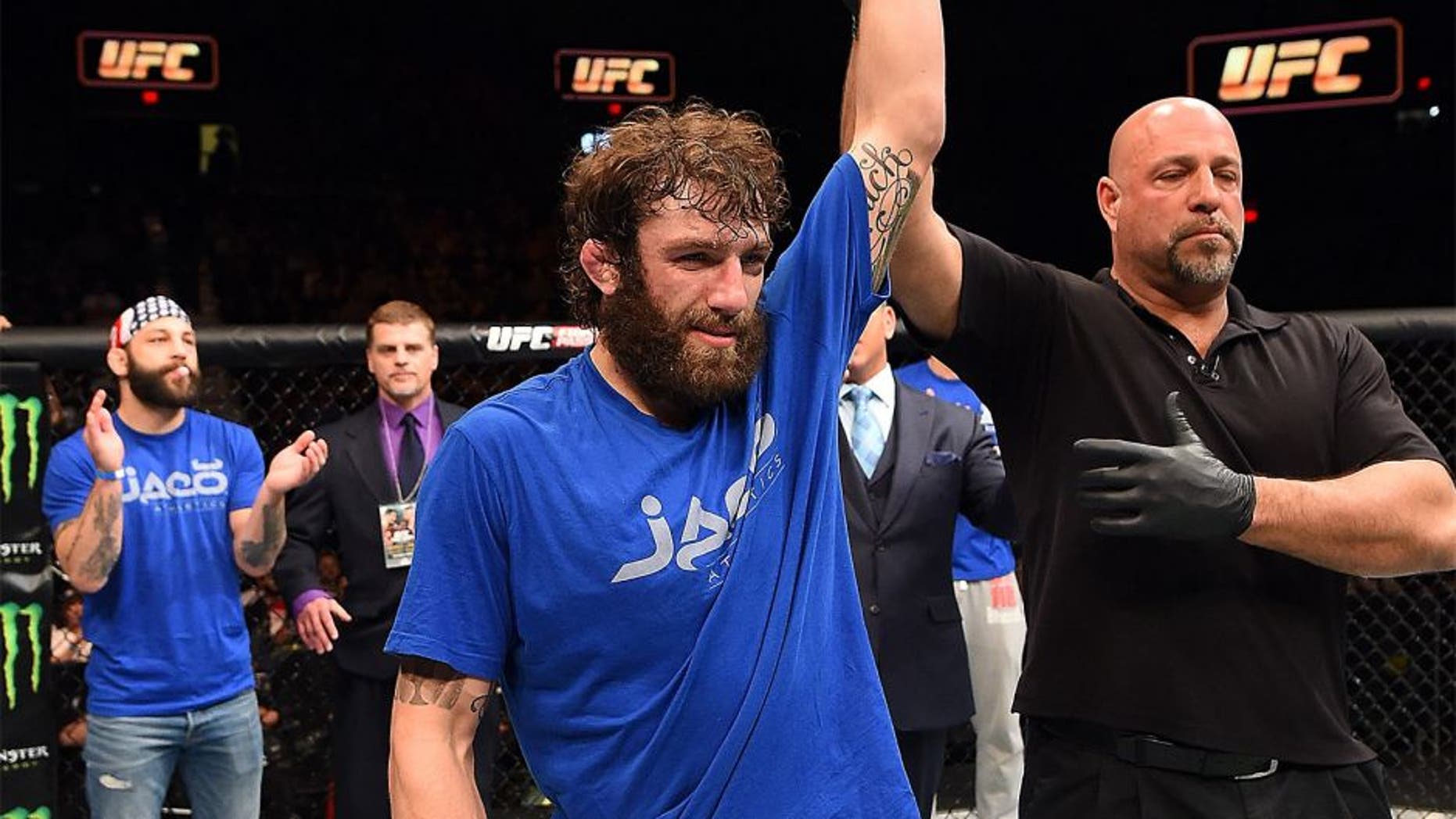 FAIRFAX, VA - APRIL 04: Michael Chiesa celebrates after defeating Mitch Clarke in their lightweight fight during the UFC Fight Night event at the Patriot Center on April 4, 2015 in Fairfax, Virginia. (Photo by Josh Hedges/Zuffa LLC/Zuffa LLC via Getty Images)