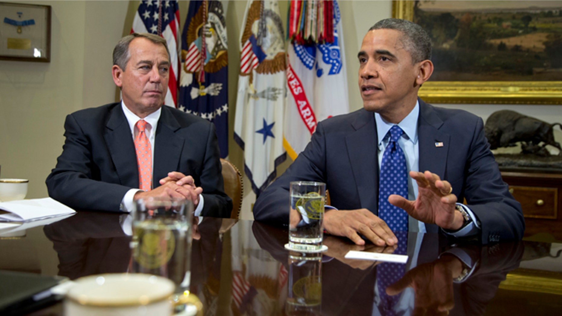 Nov. 16, 2012: President Barack Obama, accompanied by House Speaker John Boehner of Ohio, speaks to reporters in the Roosevelt Room of the White House in Washington.