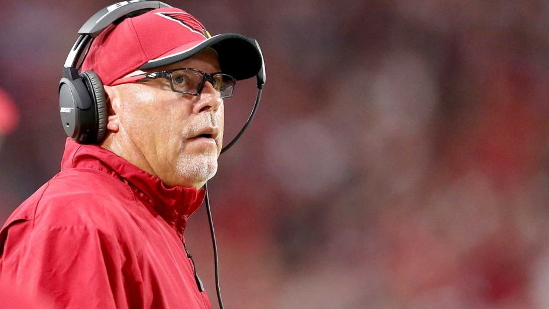 GLENDALE, AZ - DECEMBER 07: Head coach Bruce Arians of the Arizona Cardinals looks up to the video board during the NFL game against the Kansas City Chiefs at the University of Phoenix Stadium on December 7, 2014 in Glendale, Arizona. The Cardinals defeated the Chiefs 17-14. (Photo by Christian Petersen/Getty Images)