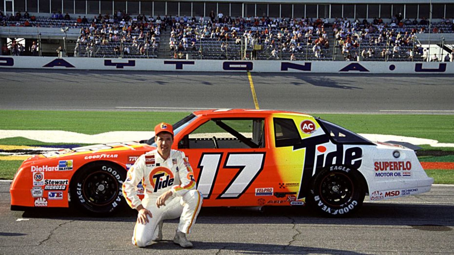 DAYTONA BEACH, FL - FEBRUARY 1989: Darrell Waltrip poses with the Rick Hendrick Chevrolet. (Photo by ISC Archives via Getty Images)