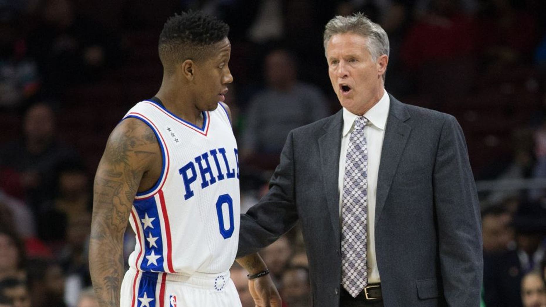 Dec 7, 2015; Philadelphia, PA, USA; Philadelphia 76ers head coach Brett Brown talks with guard Isaiah Canaan (0) during a timeout against the San Antonio Spurs at Wells Fargo Center. The Spurs won 119-68. Mandatory Credit: Bill Streicher-USA TODAY Sports