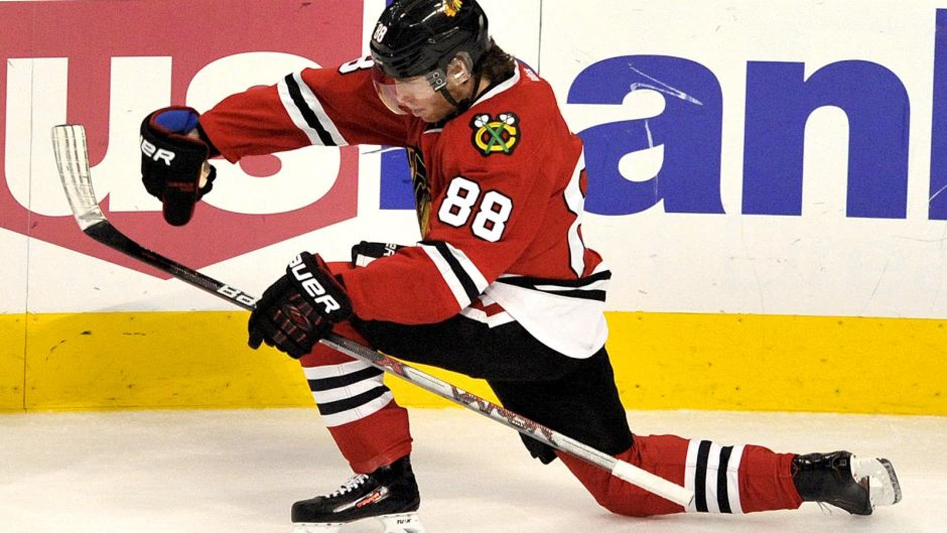 Chicago Blackhawks' Patrick Kane (88), celebrates after scoring a goal during the second period of a hockey game against the Winnipeg Jets Friday, Dec. 11, 2015, in Chicago. (AP Photo/Paul Beaty)