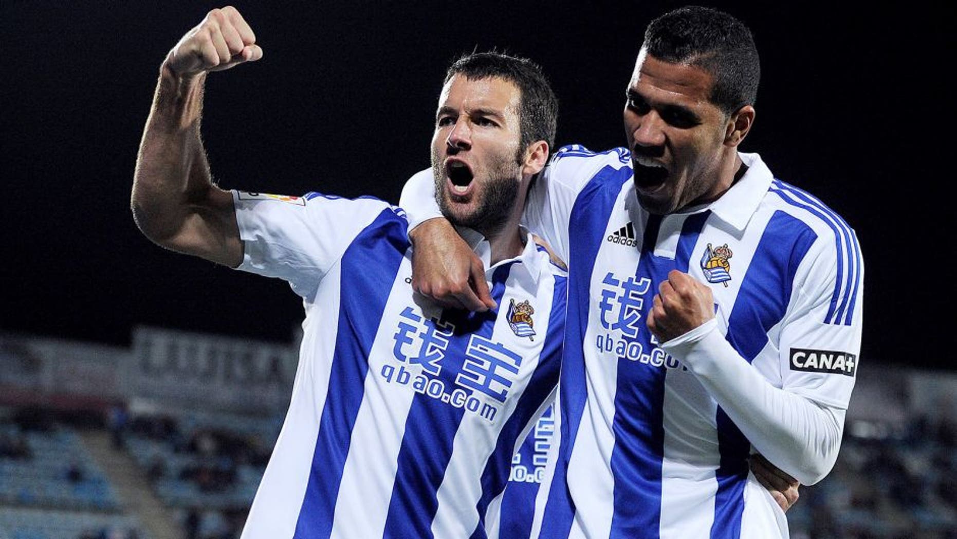 GETAFE, SPAIN - DECEMBER 11: Imanol Agirretxe of Real Sociedad celebrates with Jonathas after scoring his team's opening goal during the La Liga match between Getafe CF and Real Sociedad de Futbol at Coliseum Alfonso Perez stadium on December 11, 2015 in Getafe, Spain. (Photo by Denis Doyle/Getty Images)
