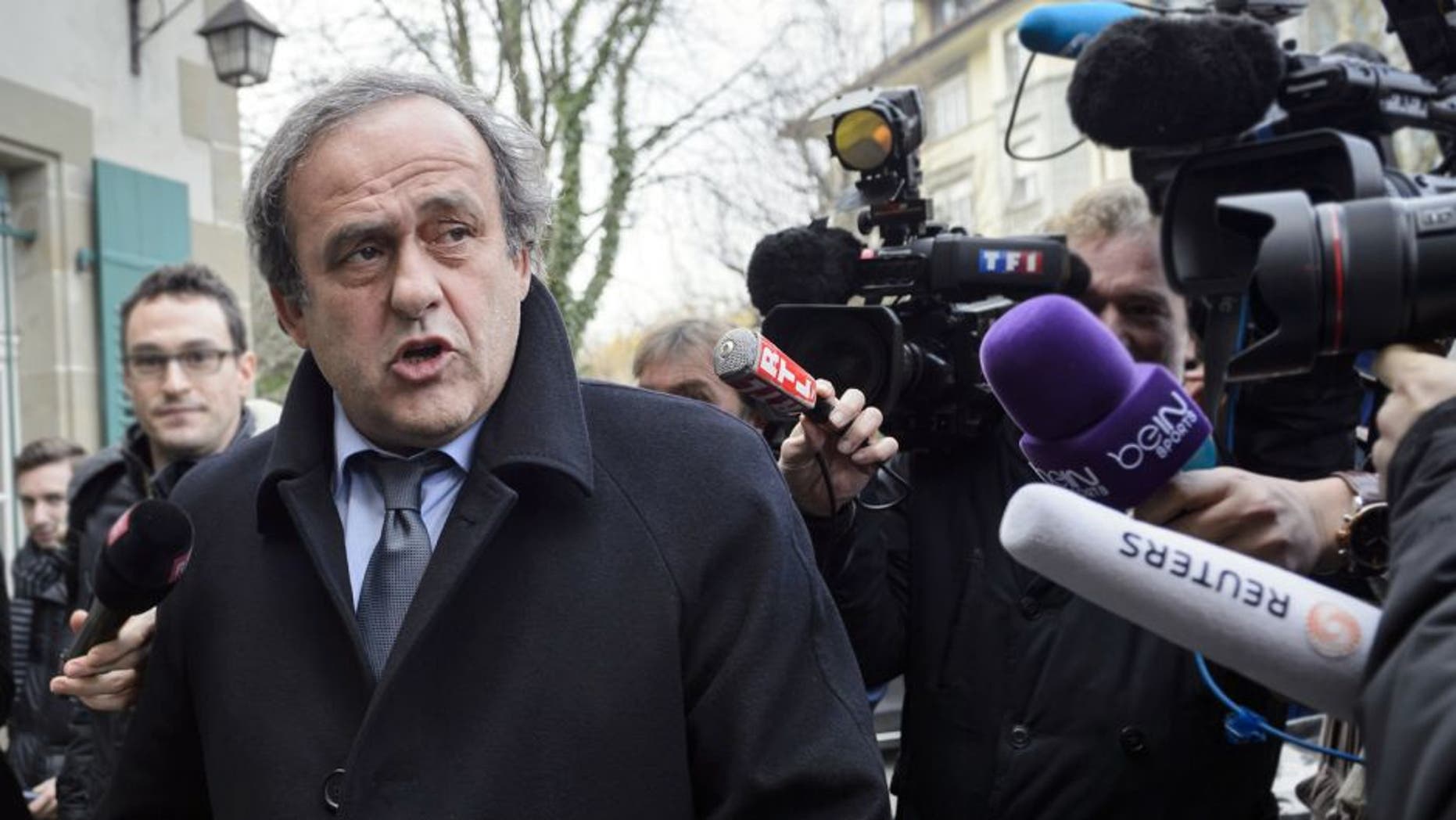 UEFA president and FIFA vice president Michel Platini speaks to the press as he arrives at the Court of Arbitration for Sport (CAS) to appeal against a 90-day suspension in Lausanne on December 8, 2015. The appeal is part of a new campaign by Platini to get back into the election for a new FIFA leader on February 26. / AFP / FABRICE COFFRINI (Photo credit should read FABRICE COFFRINI/AFP/Getty Images)