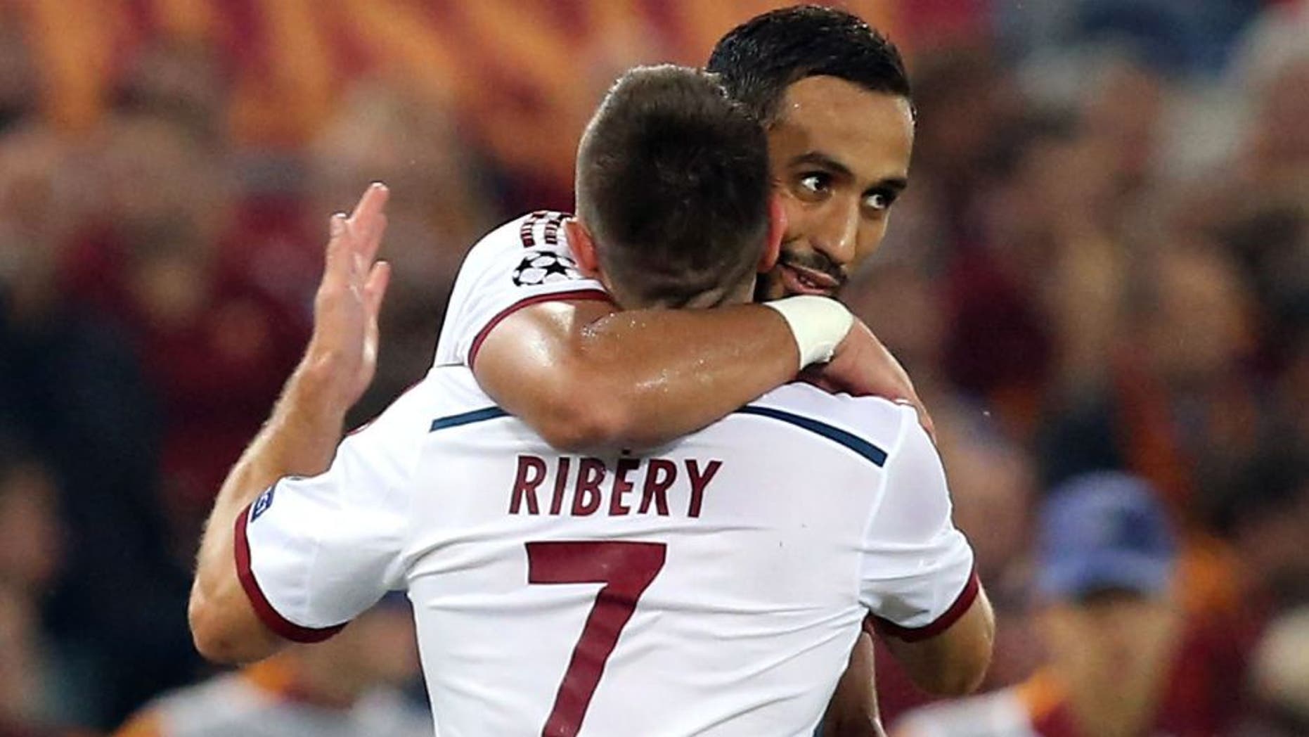 ROME, ITALY - OCTOBER 21: Mehdi Benatia (R) and Franck Ribery of Bayern Muenchen celebrate during the UEFA Champions League match between AS Roma and FC Bayern Munchen at Stadio Olimpico on October 21, 2014 in Rome, Italy (Photo by Maurizio Lagana/Getty Images)