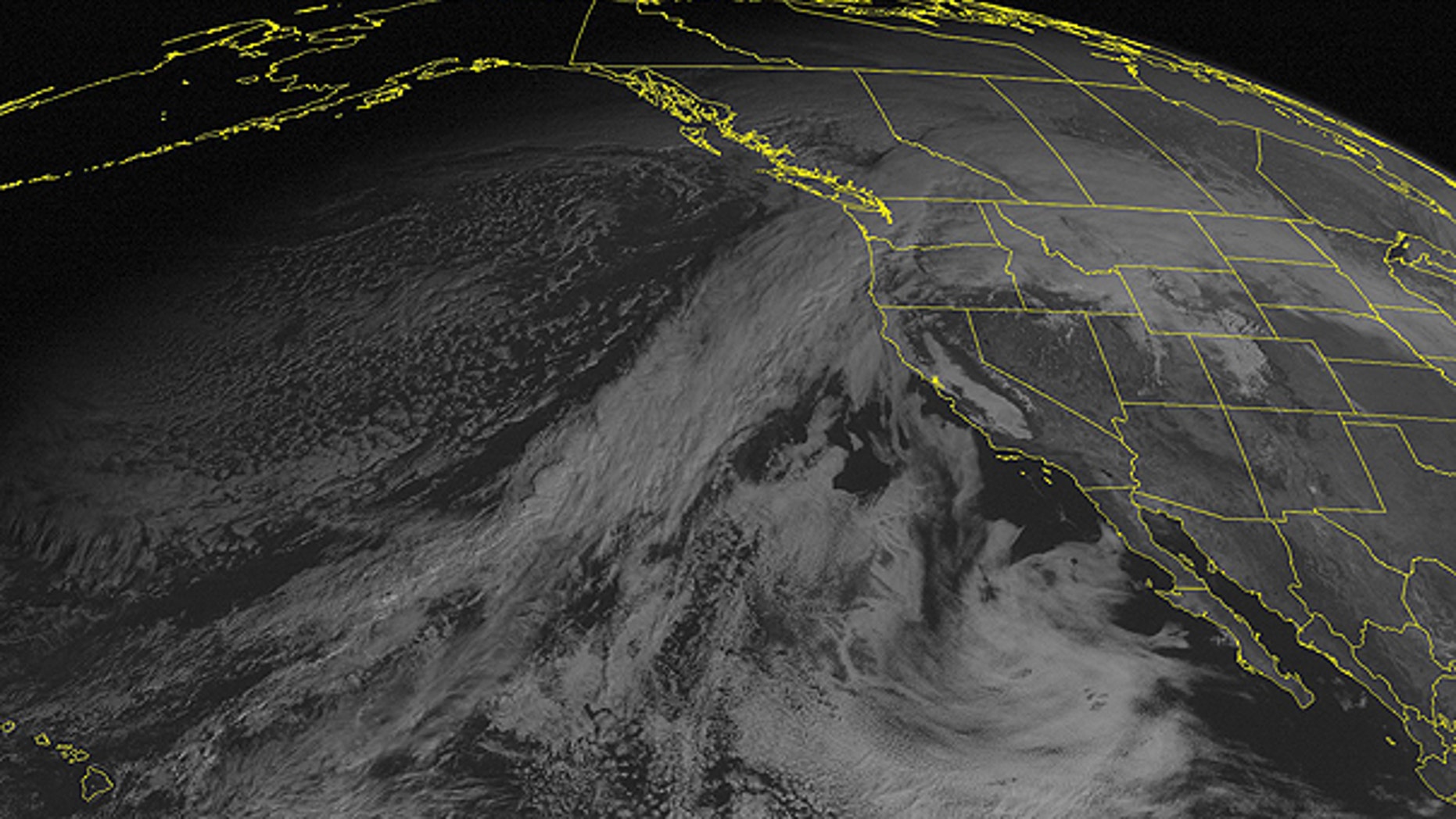 Dec. 12: This NOAA satellite image taken at 01:00 PM EST shows clouds streaming in from the eastern Pacific and spreading across the Northwest.