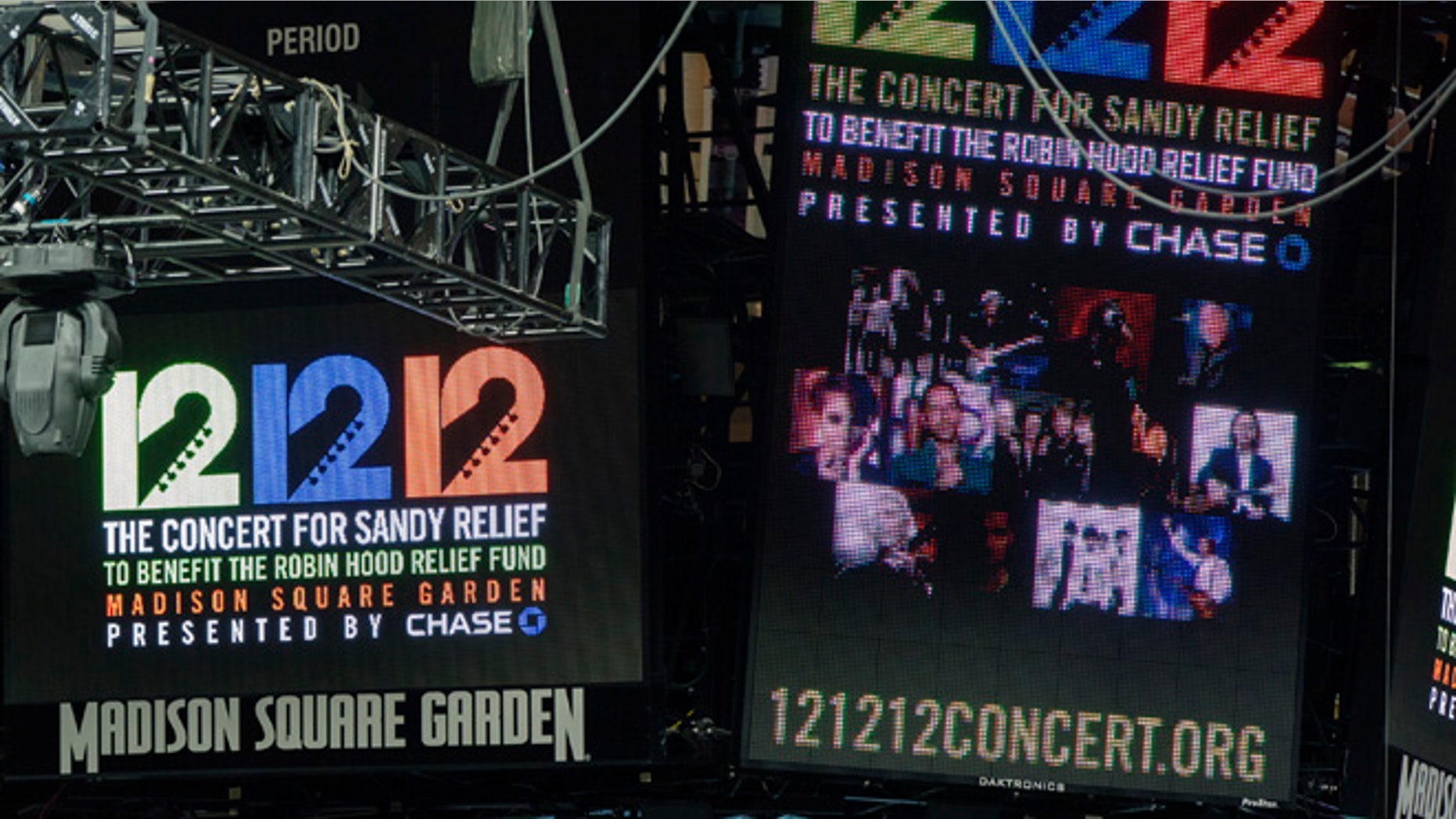 Signs are lit on the scoreboard for the 12-12-12 fundraising concert at Madison Square Garden to raise funds for victims of Hurricane Sandy in New York, December 11, 2012. REUTERS/Lucas Jackson (UNITED STATES - Tags: ENTERTAINMENT) - RTR3BGJL