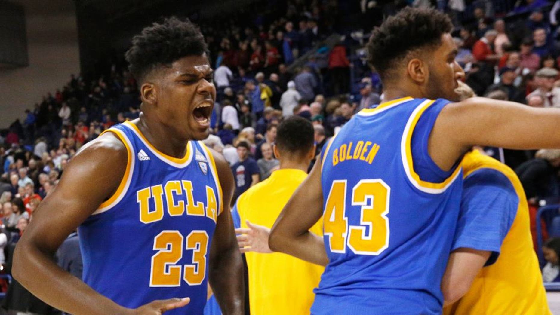 UCLA's Tony Parker (23) celebrates after an NCAA college basketball game against Gonzaga, Saturday, Dec. 12, 2015, in Spokane, Wash. UCLA won 71-66. (AP Photo/Young Kwak)