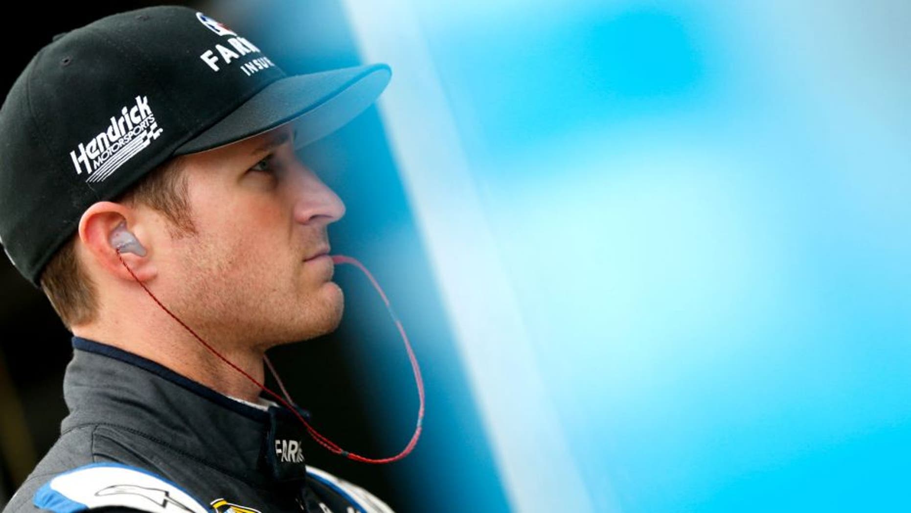 FORT WORTH, TX - NOVEMBER 06: Kasey Kahne, driver of the #5 Farmers Insurance Chevrolet, stands in the garage area during practice for the NASCAR Sprint Cup Series AAA Texas 500 at Texas Motor Speedway on November 6, 2015 in Fort Worth, Texas. (Photo by Brian Lawdermilk/Getty Images for Texas Motor Speedway)