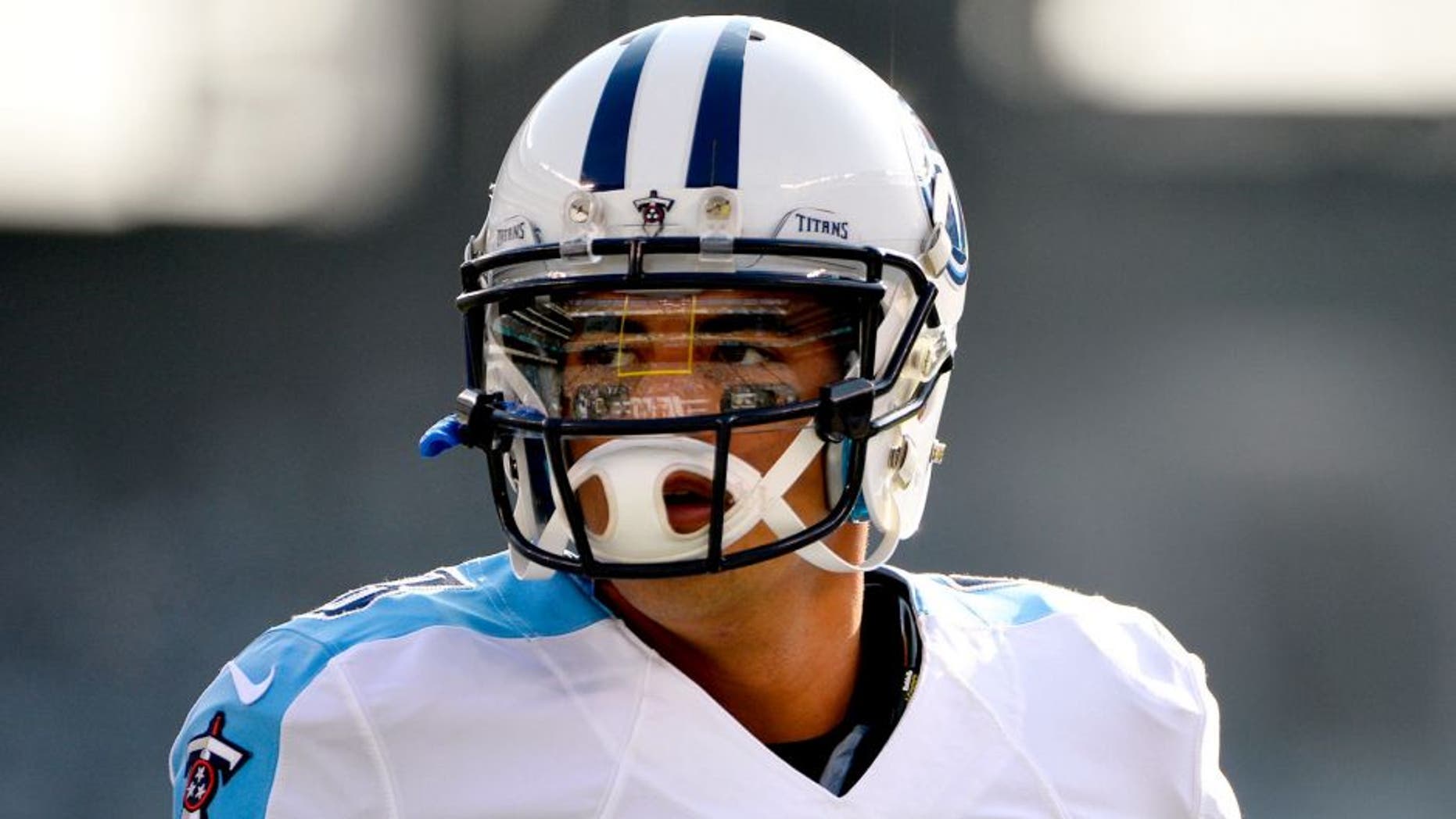 EAST RUTHERFORD, NJ - DECEMBER 13: Marcus Mariota #8 of the Tennessee Titans warms up for their game against the New York Jets at MetLife Stadium on December 13, 2015 in East Rutherford, New Jersey. (Photo by Alex Goodlett/Getty Images)