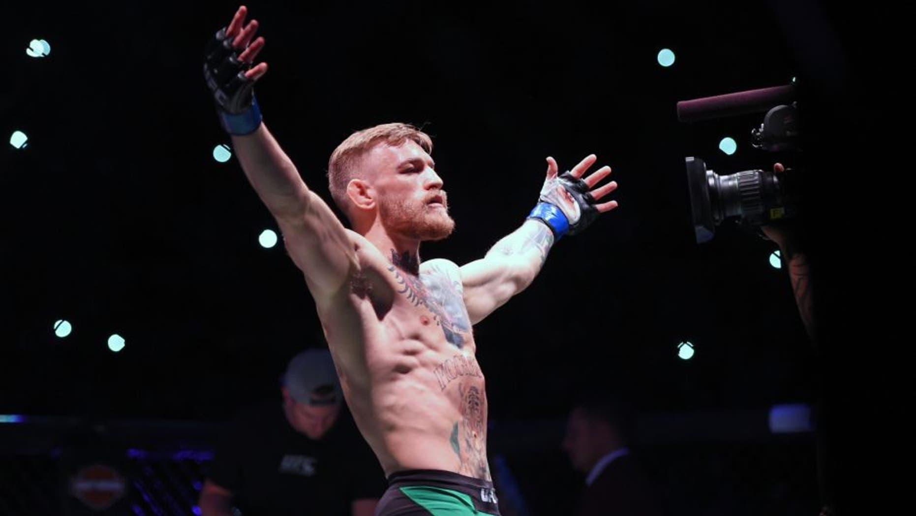 LAS VEGAS, NEVADA - DECEMBER 12: Conor McGregor of Ireland is introduced to the crowd before facing Jose Aldo of Brazil in their featherweight championship bout during the UFC 194 event inside MGM Grand Garden Arena on December 12, 2015 in Las Vegas, Nevada. (Photo by Jeff Bottari/Zuffa LLC/Zuffa LLC via Getty Images)