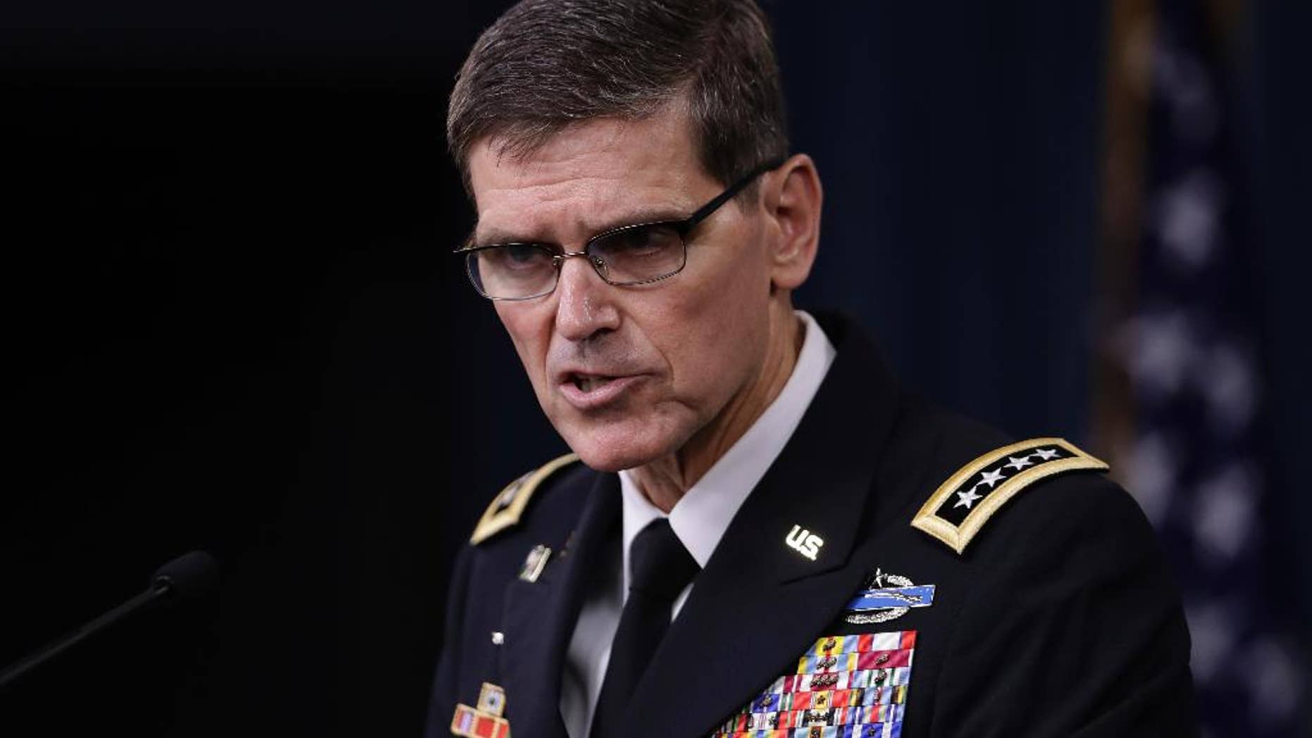 FILE - In this Aug. 30, 2016 file photo, U.S. Central Command Command Commander, U.S. Army Gen. Joseph Votel speaks to reporters at the Pentagon. Votel says he has completed an exhaustive review of the Yemen raid that killed a Navy SEAL, and he concluded there were no lapses in judgment or decision making surrounding the operation, and he sees no need for additional investigations. (AP Photo/Manuel Balce Ceneta, File)