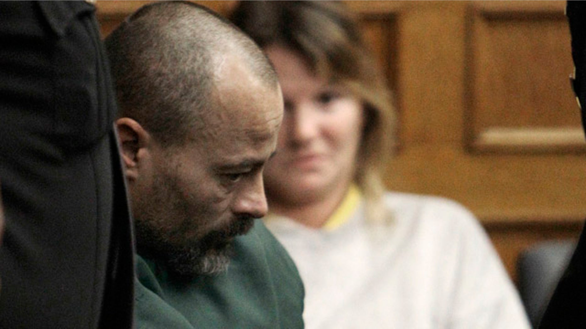 In this Dec. 1, 2010 file photo, John Skelton appears at his extradition hearing in Lucas County Court in Toledo, Ohio.