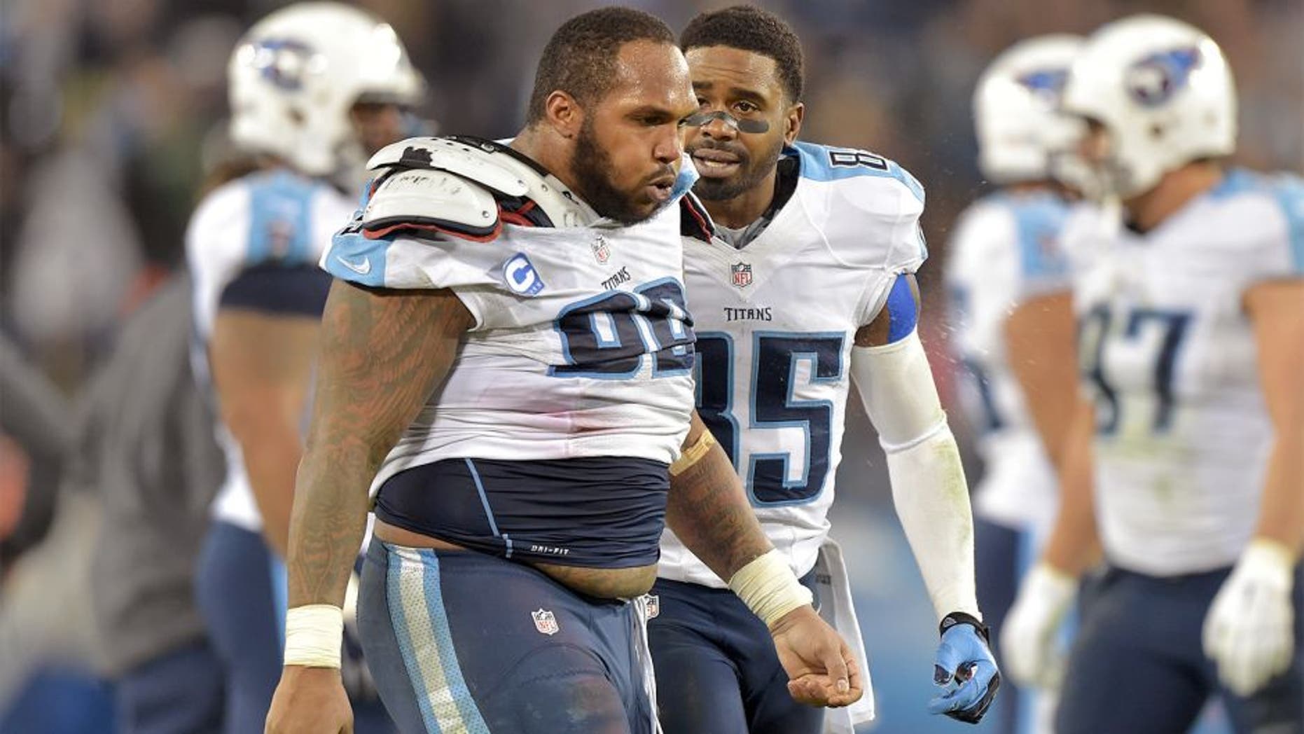 Dec 14, 2014; Nashville, TN, USA; Tennessee Titans wide receiver Nate Washington (85) talks with Titans defensive tackle Jurrell Casey after a fight between the Titans and the New York Jets during the second half at LP Field. The Jets beat the Titans 16-11. Mandatory Credit: Don McPeak-USA TODAY Sports