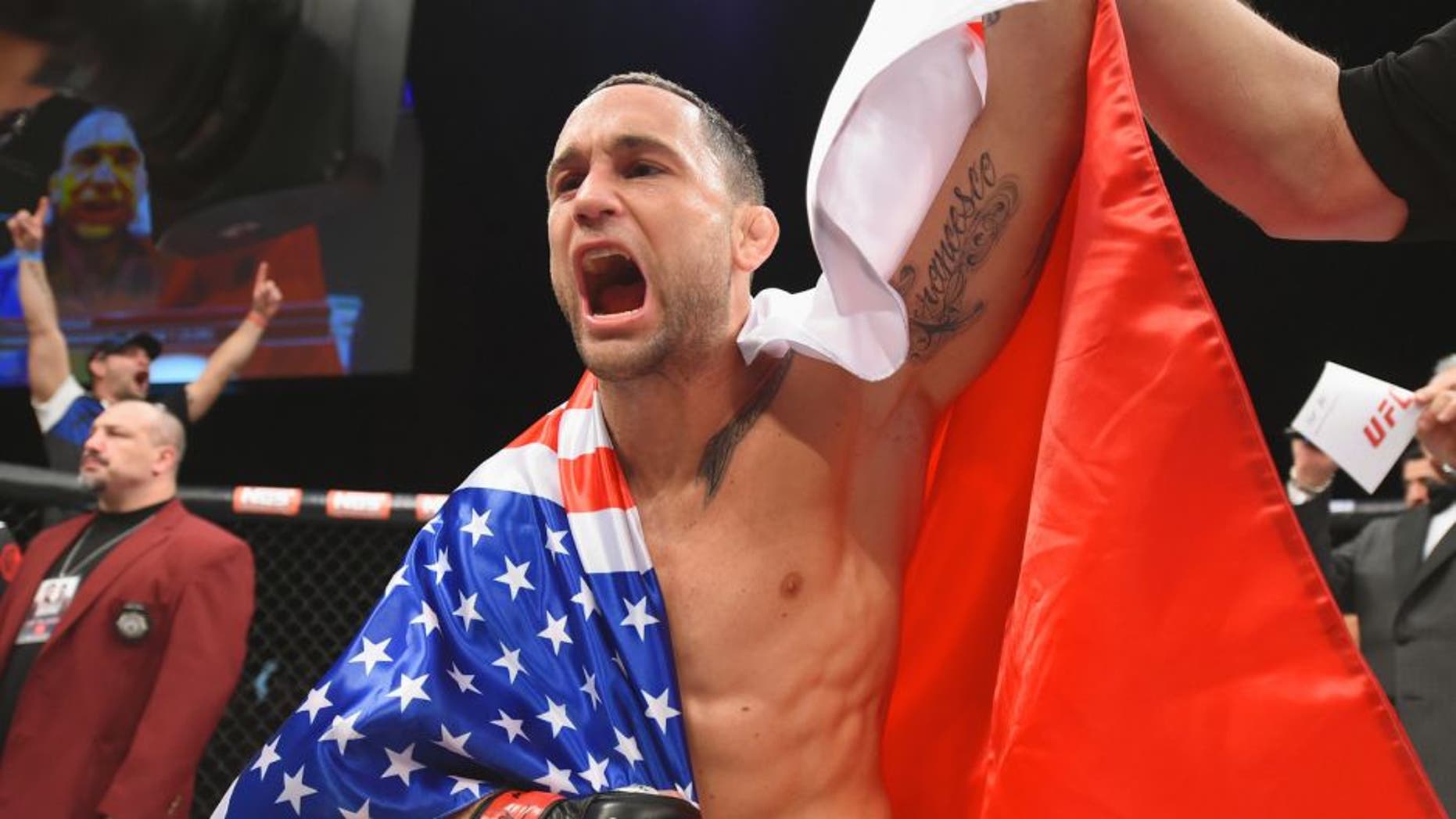 Frankie Edgar reacts to his victory over Chad Mendes in their featherweight bout during the TUF Finale event inside The Chelsea at The Cosmopolitan of Las Vegas on December 11, 2015 in Las Vegas, Nevada. (Photo by Jeff Bottari/Zuffa LLC/Zuffa LLC via Getty Images)