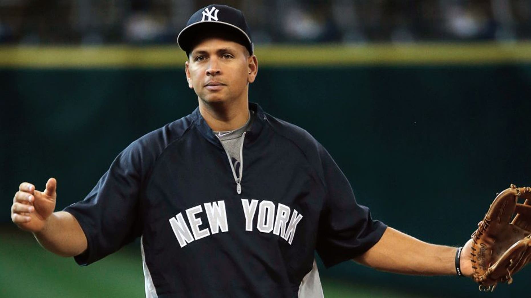 HOUSTON, TX - SEPTEMBER 27: Alex Rodriguez #13 of the New York Yankees works out on the field before the game against the Houston Astros at Minute Maid Park on September 27, 2013 in Houston, Texas. (Photo by Scott Halleran/Getty Images)