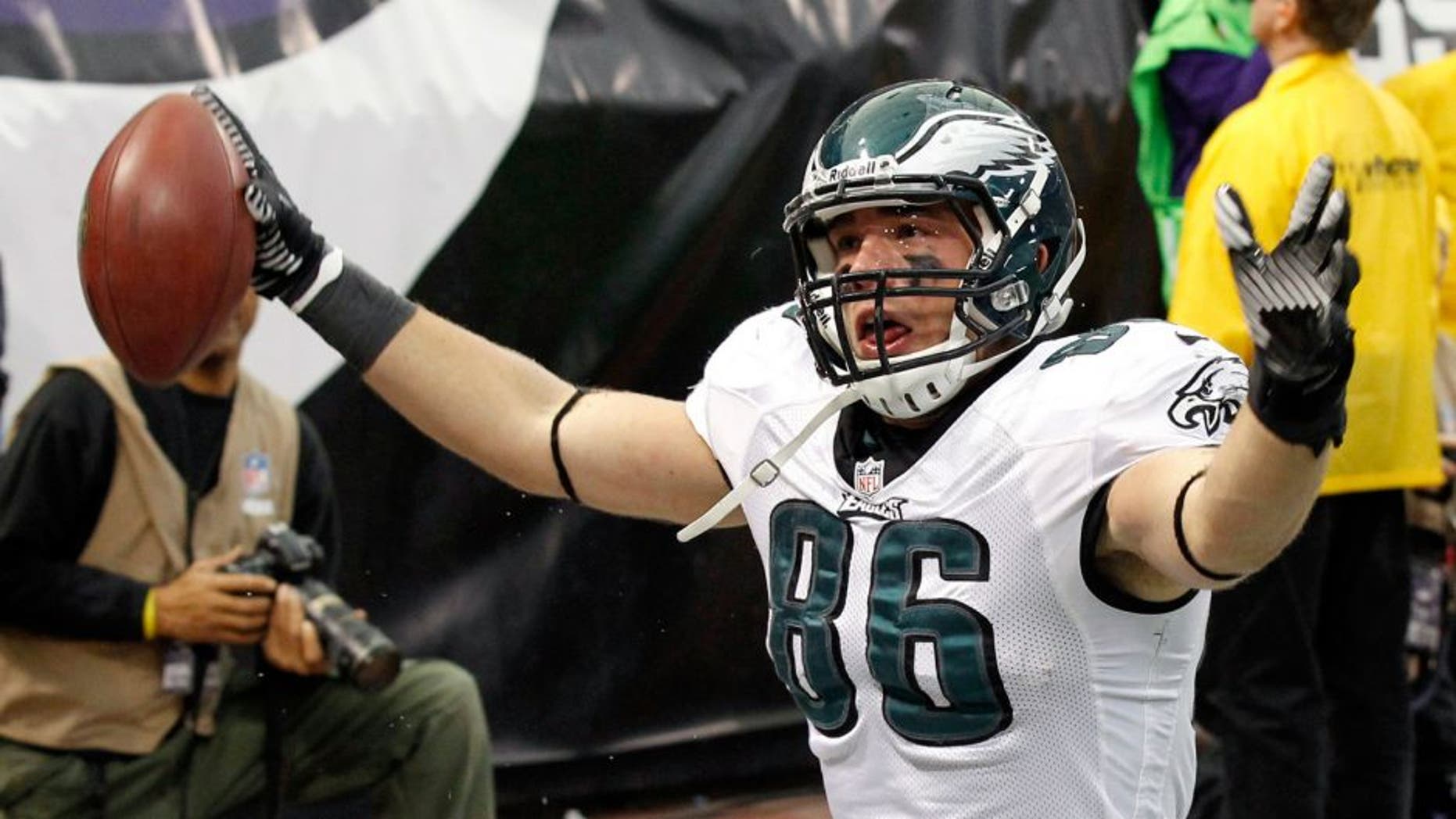 Philadelphia Eagles tight end Zach Ertz reacts after catching a 3-yard touchdown pass during the second half of an NFL football game against the Minnesota Vikings, Sunday, Dec. 15, 2013, in Minneapolis. (AP Photo/Ann Heisenfelt)