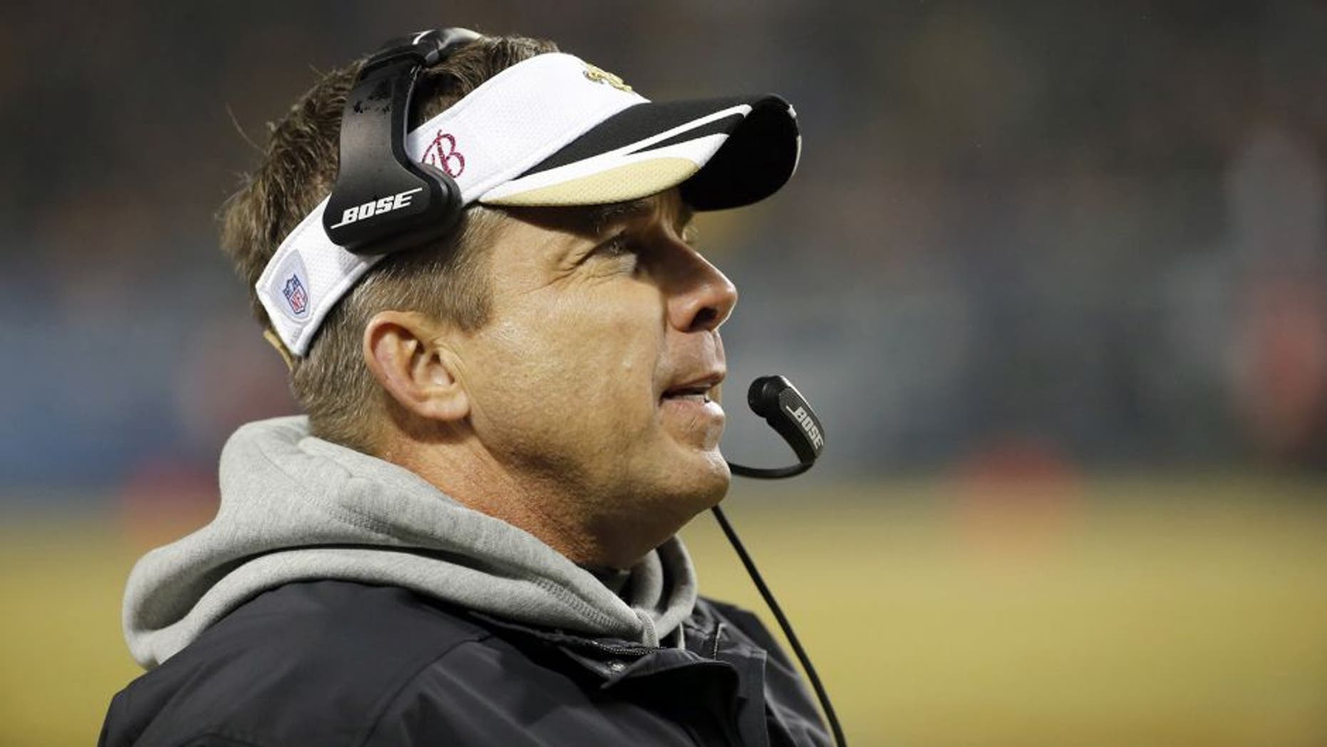 New Orleans Saints head coach Sean Payton watches from the sideline during the first half of an NFL football game against the Chicago Bears Monday, Dec. 15, 2014, in Chicago. (AP Photo/Charles Rex Arbogast)
