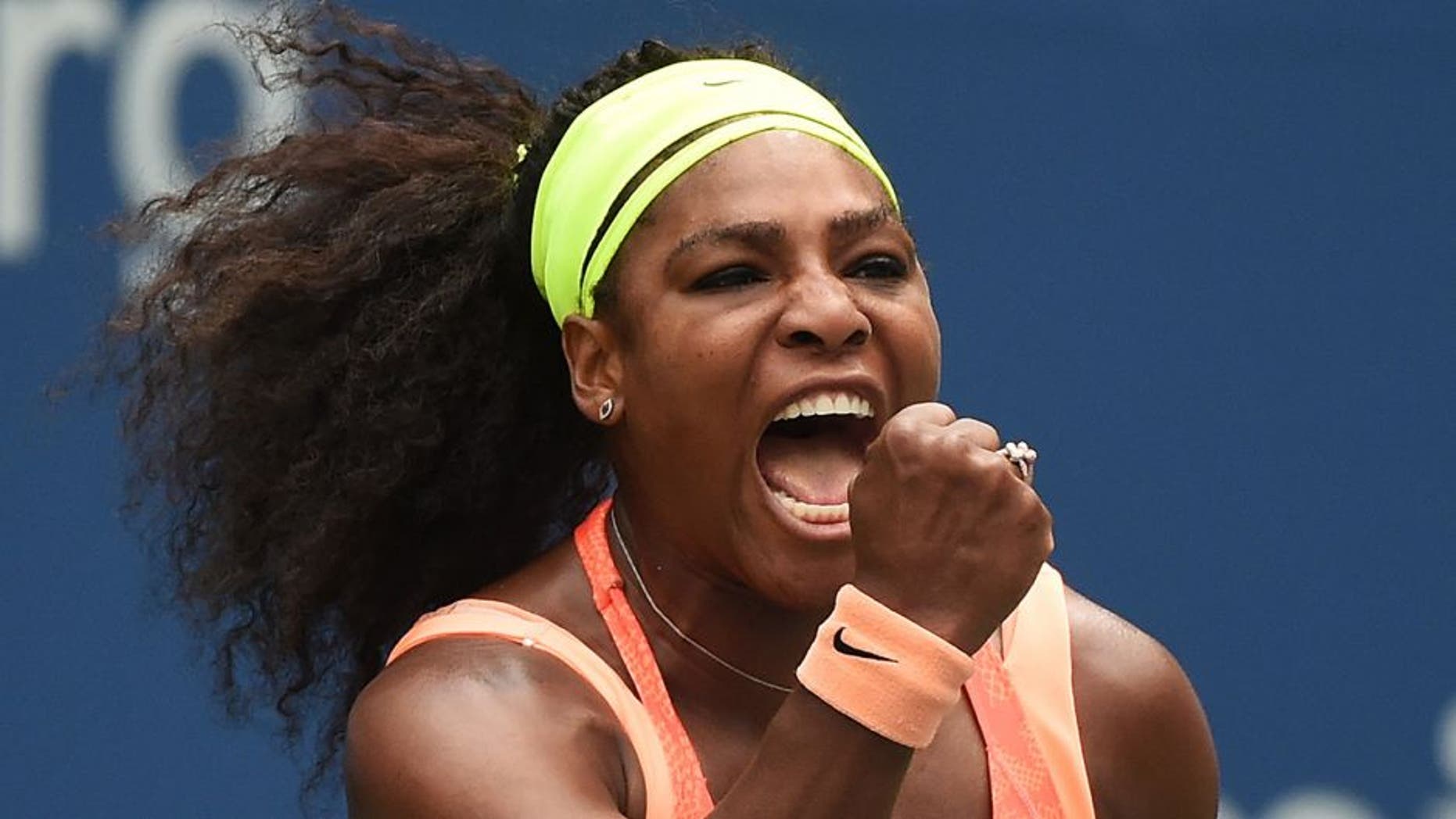 Serena Williams of the US celebrates winning a point against Roberta Vinci of Italy during their 2015 US Open Women's singles semifinals match at the USTA Billie Jean King National Tennis Center in New York on September 11, 2015. AFP PHOTO/JEWEL SAMAD (Photo credit should read JEWEL SAMAD/AFP/Getty Images)