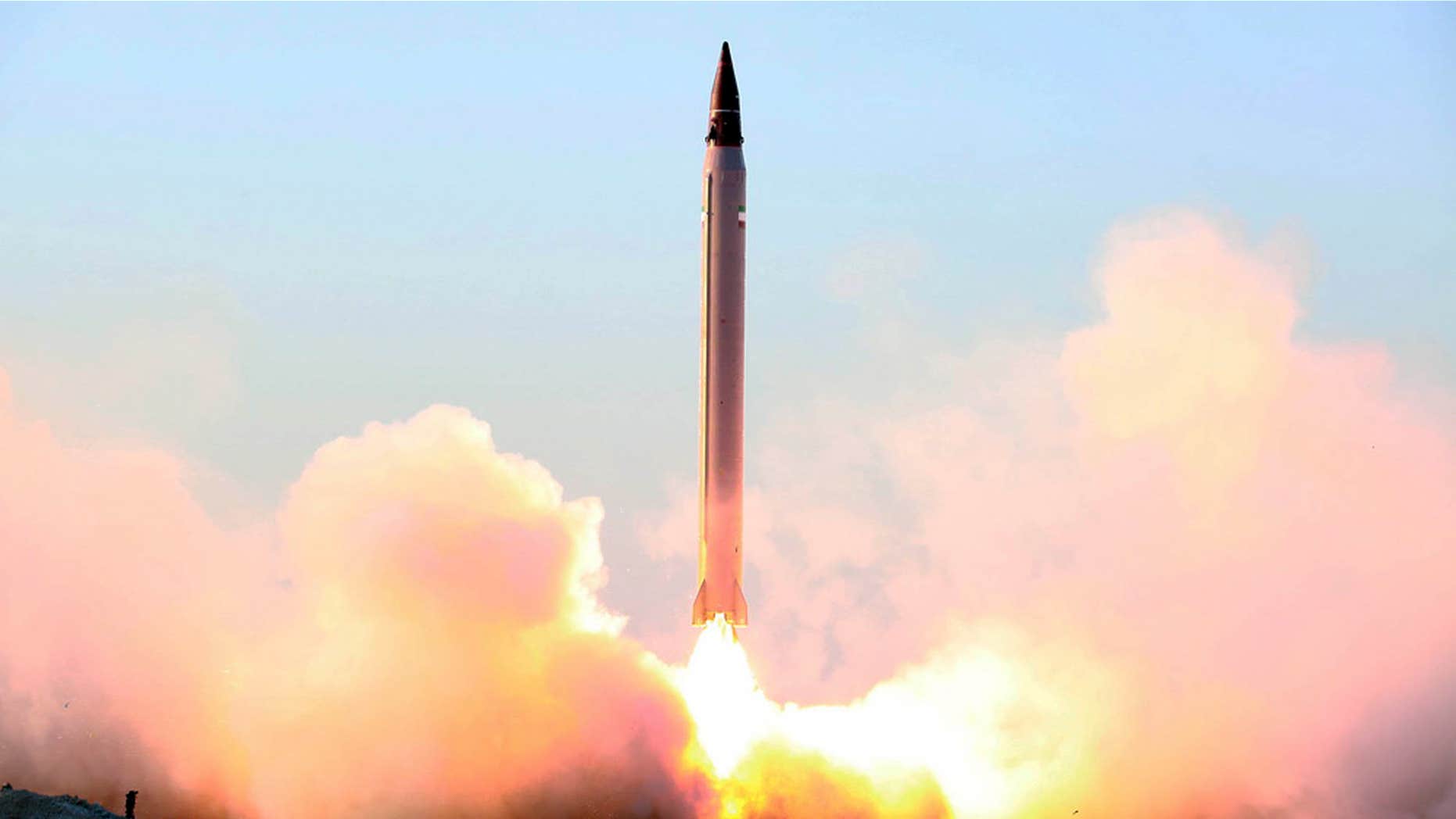 FILE - This file picture released by the official website of the Iranian Defense Ministry on Sunday, Oct. 11, 2015, claims to show the launching of an Emad long-range ballistic surface-to-surface missile in an undisclosed location.