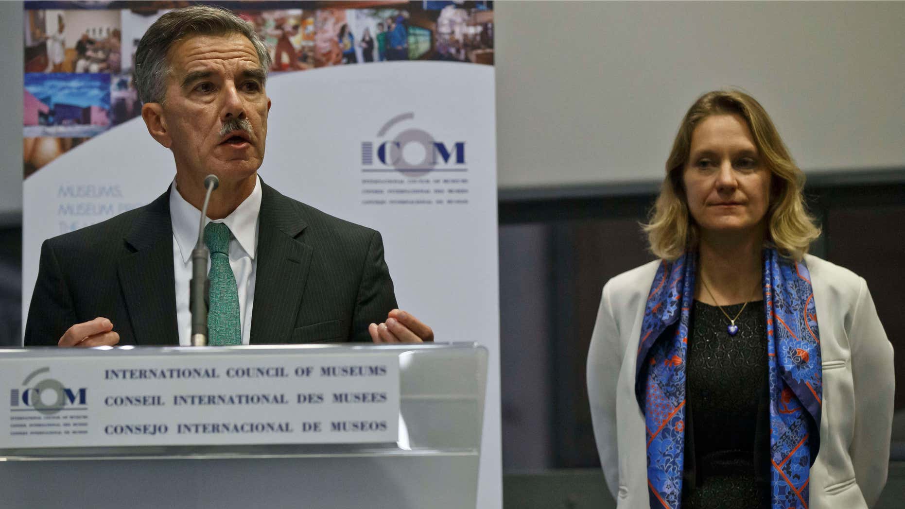 Dec. 15, 2015: U.S. Deputy Assistant Secretary of State for Educational and Cultural Affairs Mark Taplin, left, speaks to the media during a media conference while Director General of the International Council of Museums Anne-Catherine Robert-Hauglustaine stands next to him in Paris.