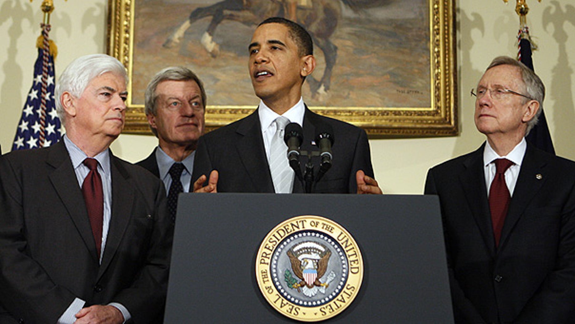Dec. 15: President Obama, flanked by Senate Democrats, makes a statement on health care reform. (AP)