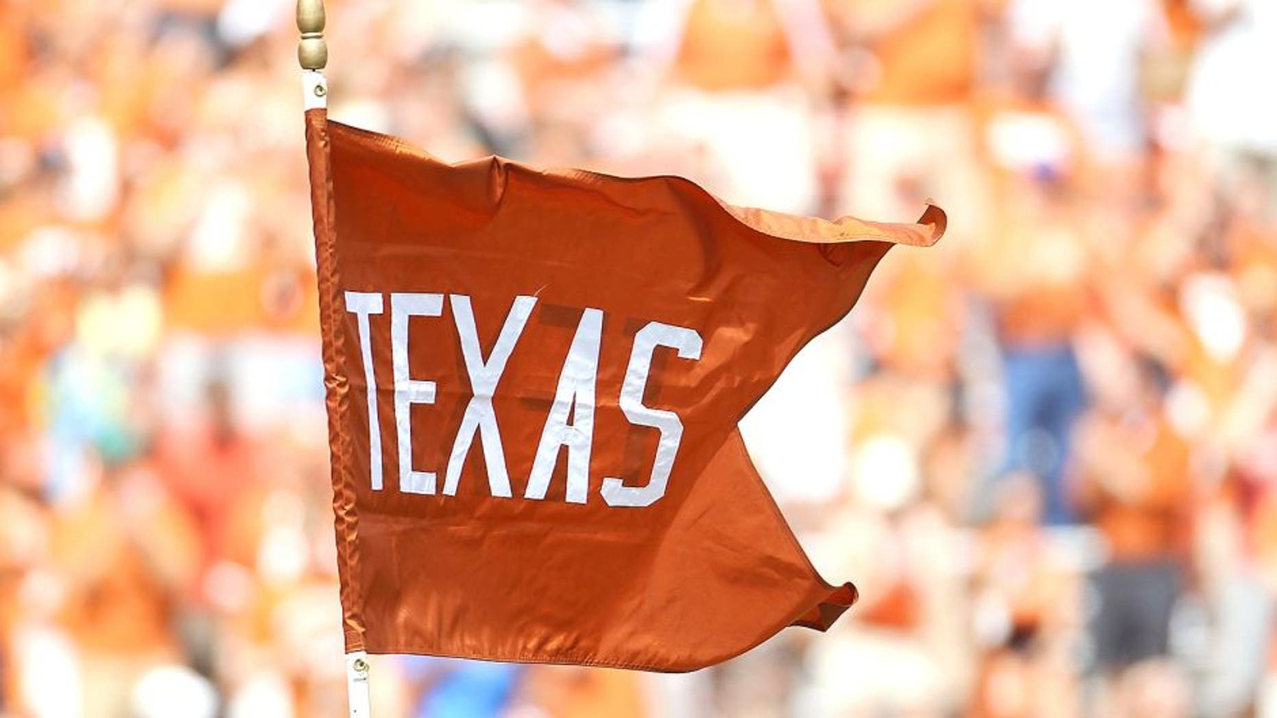 AUSTIN, TX - SEPTEMBER 25: A flag for the Texas Longhorns waves at Darrell K Royal-Texas Memorial Stadium on September 25, 2010 in Austin, Texas. (Photo by Ronald Martinez/Getty Images)