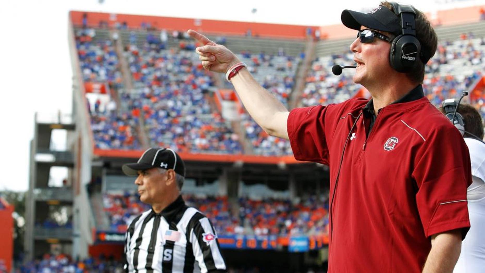 Nov 15, 2014; Gainesville, FL, USA; South Carolina Gamecocks co-offensive coordinator Steve Spurrier Jr. during the second half against the Florida Gators at Ben Hill Griffin Stadium. South Carolina Gamecocks defeated the Florida Gators 23-20 in overtime. Mandatory Credit: Kim Klement-USA TODAY Sports