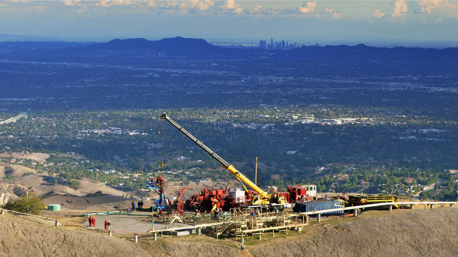 FILE- This Nov. 3, 2015, file photo provided by Southern California Gas Co., shows equipment being used as SoCalGas crews and technical experts attempt to safely stop the flow of natural gas leaking from a storage well at the utility’s Aliso Canyon facility near Northridge section of Los Angeles.