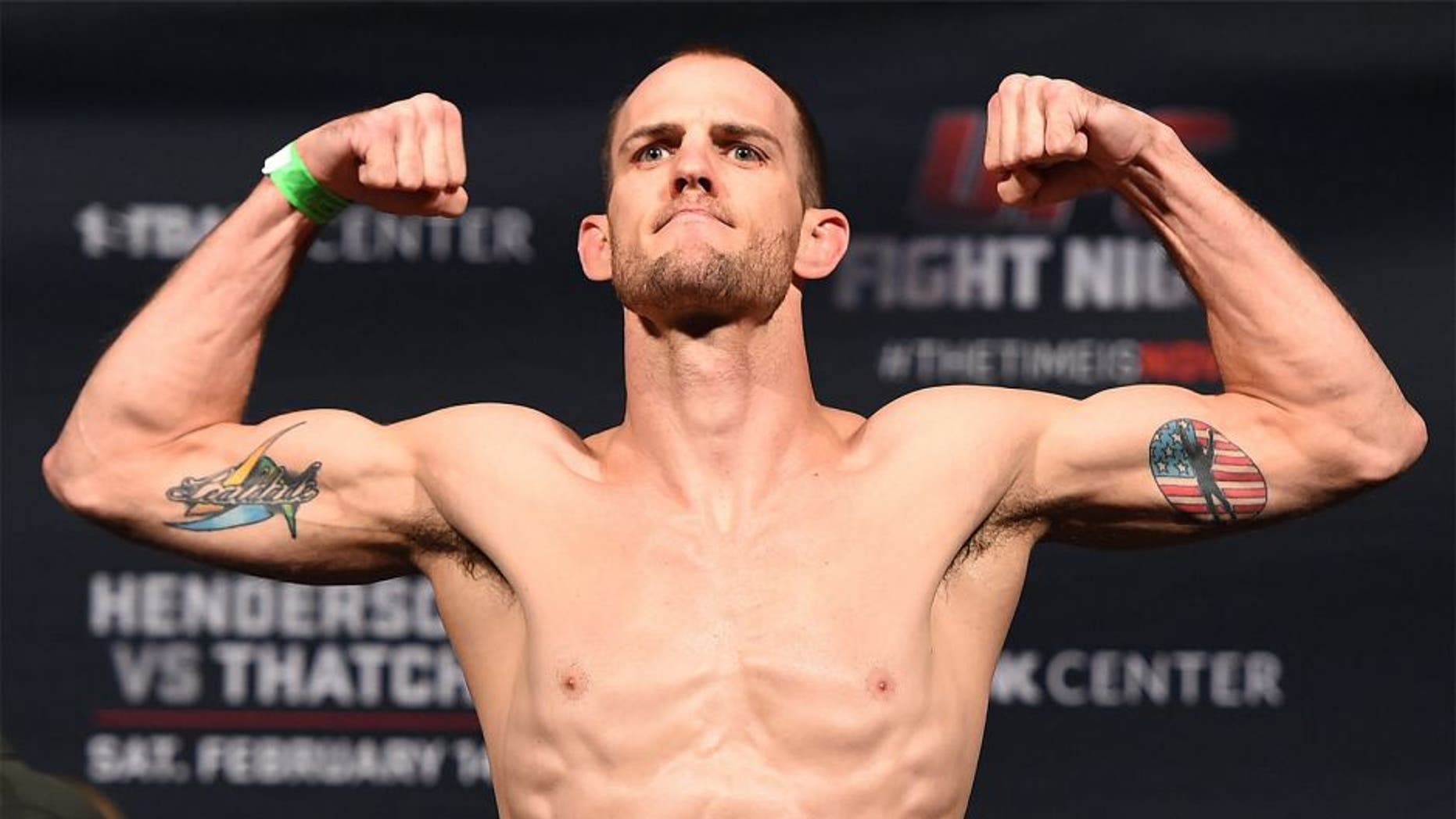 BROOMFIELD, CO - FEBRUARY 13: Cole Miller weighs in during the UFC weigh-in at the 1stBank Center on February 13, 2015 in Broomfield, Colorado. (Photo by Josh Hedges/Zuffa LLC/Zuffa LLC via Getty Images)