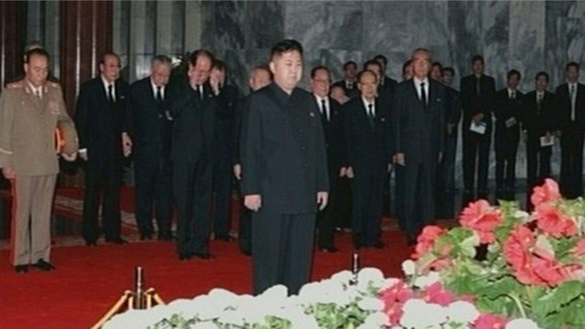 December 20, 2011: New North Korean ruler Kim Jong-un pays his respects to his father and former leader Kim Jong-il lying in state at the Kumsusan Memorial Palace in Pyongyang.