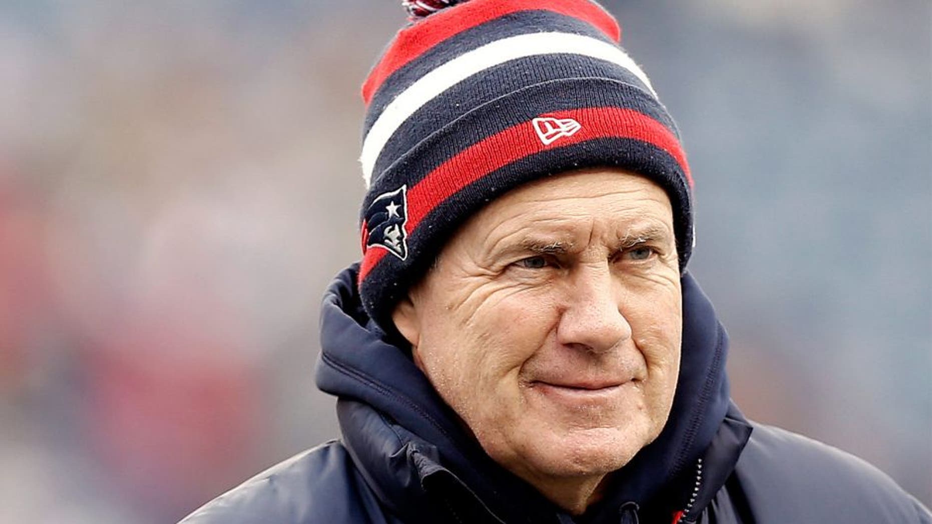 Dec 8, 2013; Foxborough, MA, USA; New England Patriots head coach Bill Belichick smiles before the game against the Cleveland Browns at Gillette Stadium. Mandatory Credit: Winslow Townson-USA TODAY Sports