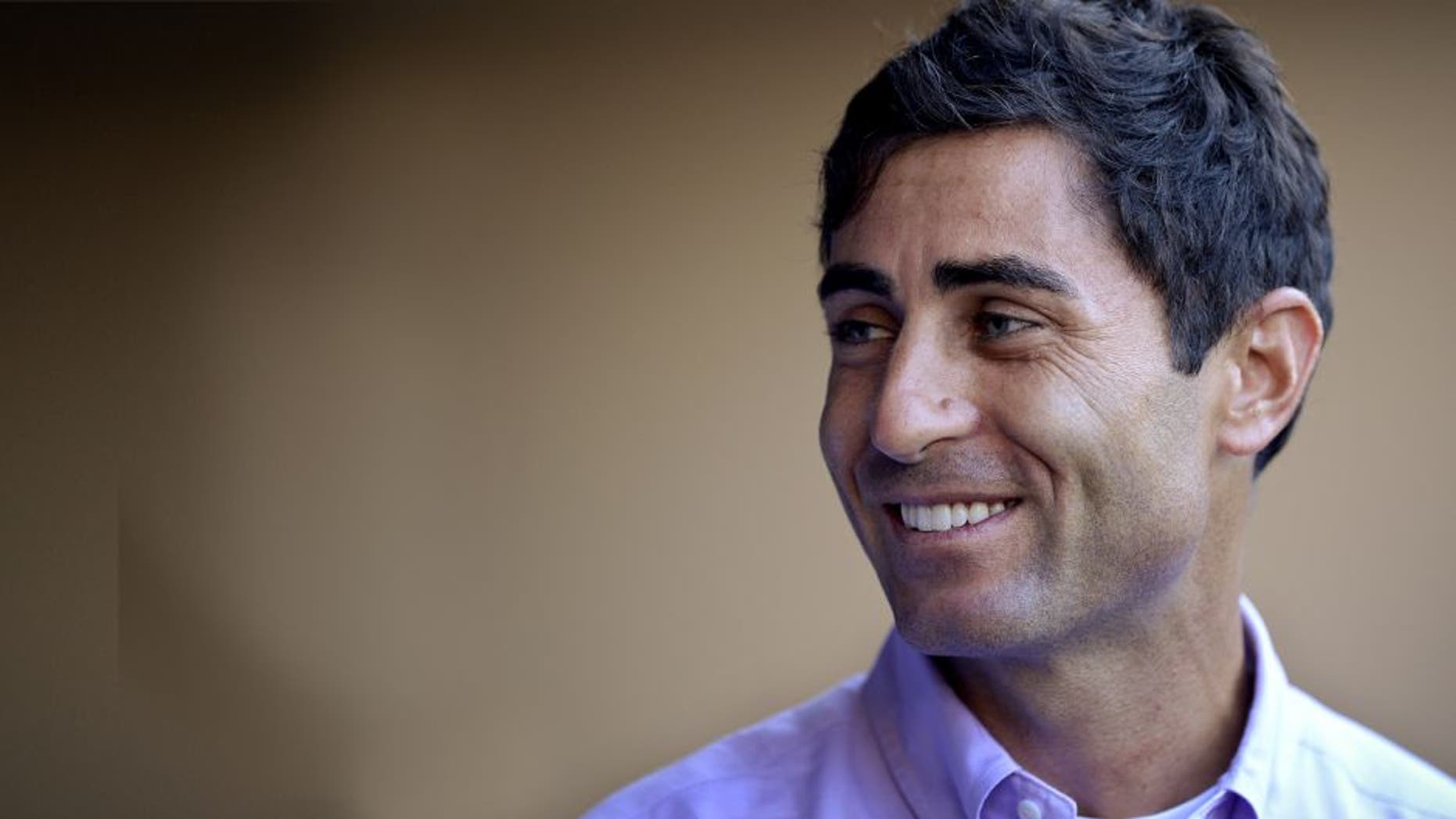 SAN DIEGO, CA - AUGUST 26: AJ Preller of the San Diego Padres visits the dugout prior to the game against the Milwaukee Brewers at Petco Park on August 26, 2014 in San Diego, California. (Photo by Andy Hayt/San Diego Padres/Getty Images)