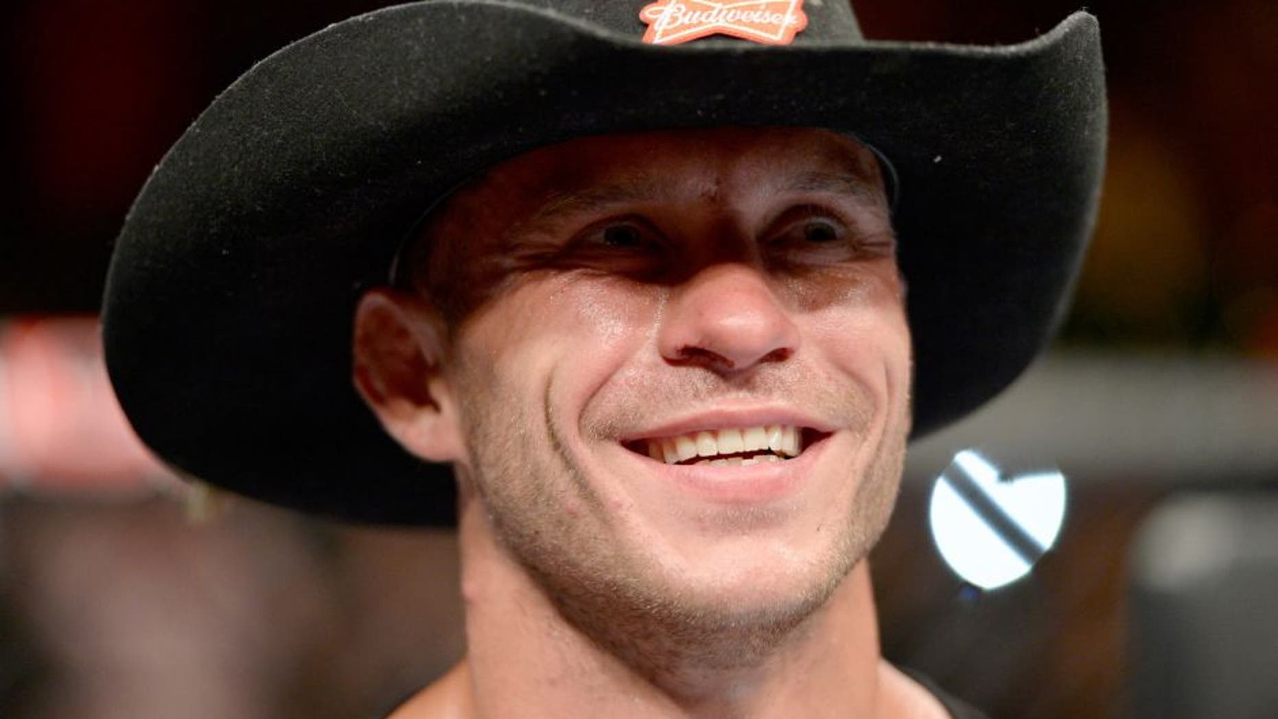 ATLANTIC CITY, NJ - JULY 16: Donald "Cowboy" Cerrone celebrates after defeating Jim Miller in their lightweight bout during the UFC Fight Night event at Revel Casino on July 16, 2014 in Atlantic City, New Jersey. (Photo by Jeff Bottari/Zuffa LLC/Zuffa LLC via Getty Images) *** Local Caption ***Donald Cerrone